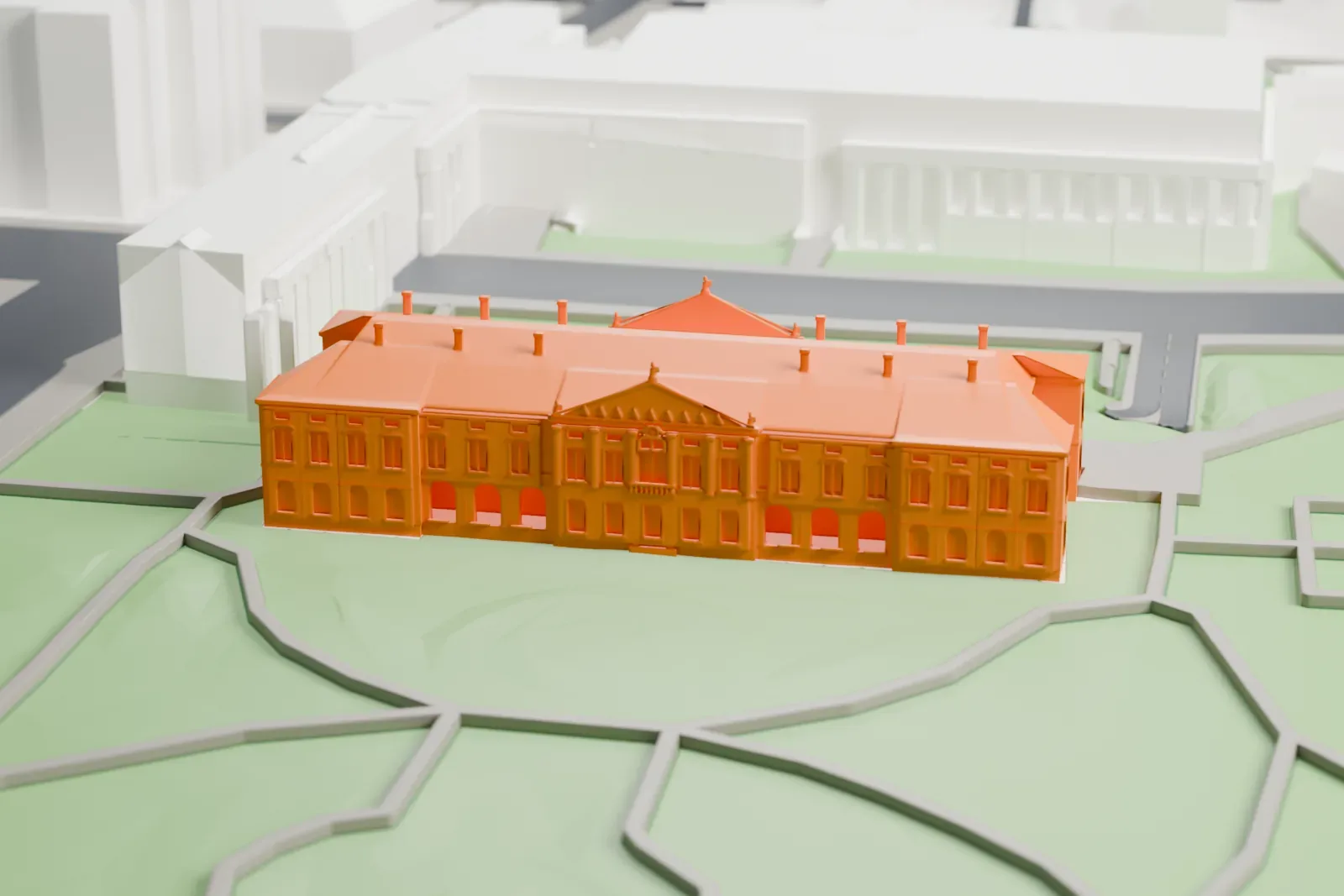 A white 3D print of the Krasiński Palace, its long Baroque facade and pediment set among the surrounding streets and buildings.