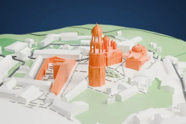 A white 3D print of the Kyiv Pechersk Lavra, with a tall octagonal bell tower beside a church crowned by several onion domes, among low buildings and green slopes.