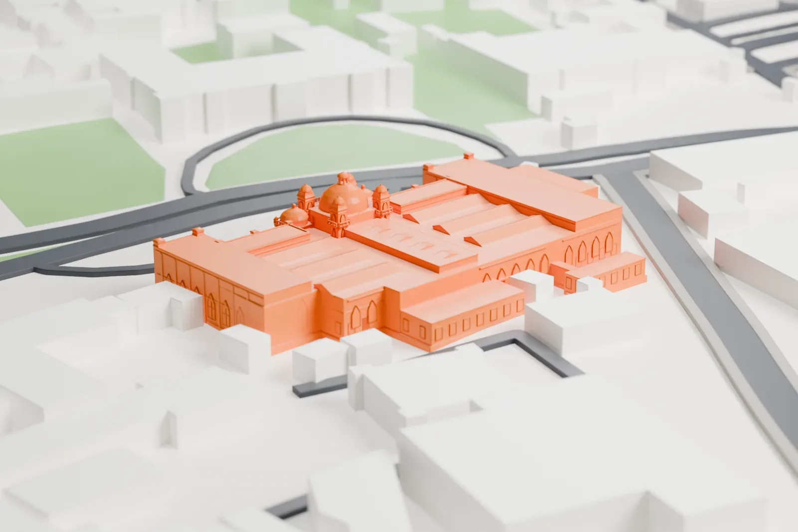 A white 3D print of the Lahore Museum, a large museum building, among the surrounding streets and buildings.