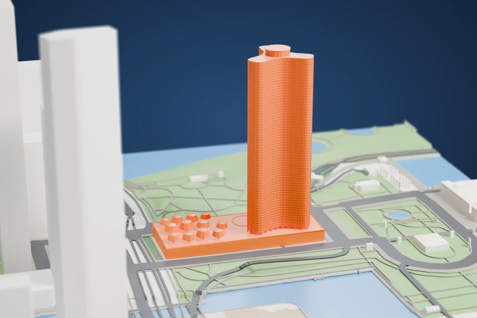 A white 3D print of Lake Point Tower, with its three curved wings rising beside Lake Michigan and Navy Pier.