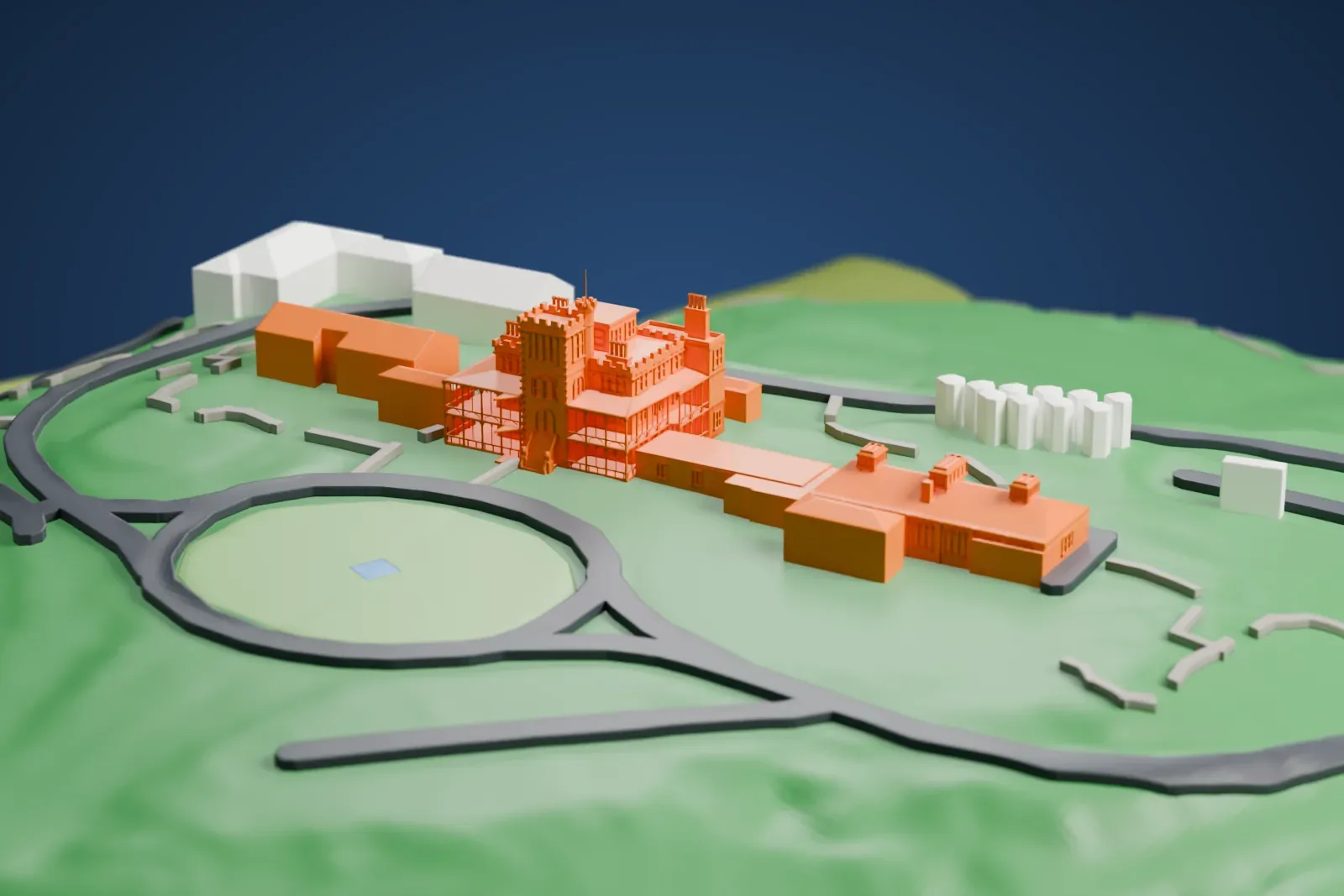 A white 3D print of Larnach Castle, a turreted mansion with a long wing, sitting on a green hillside with winding roads and a few outbuildings around it.