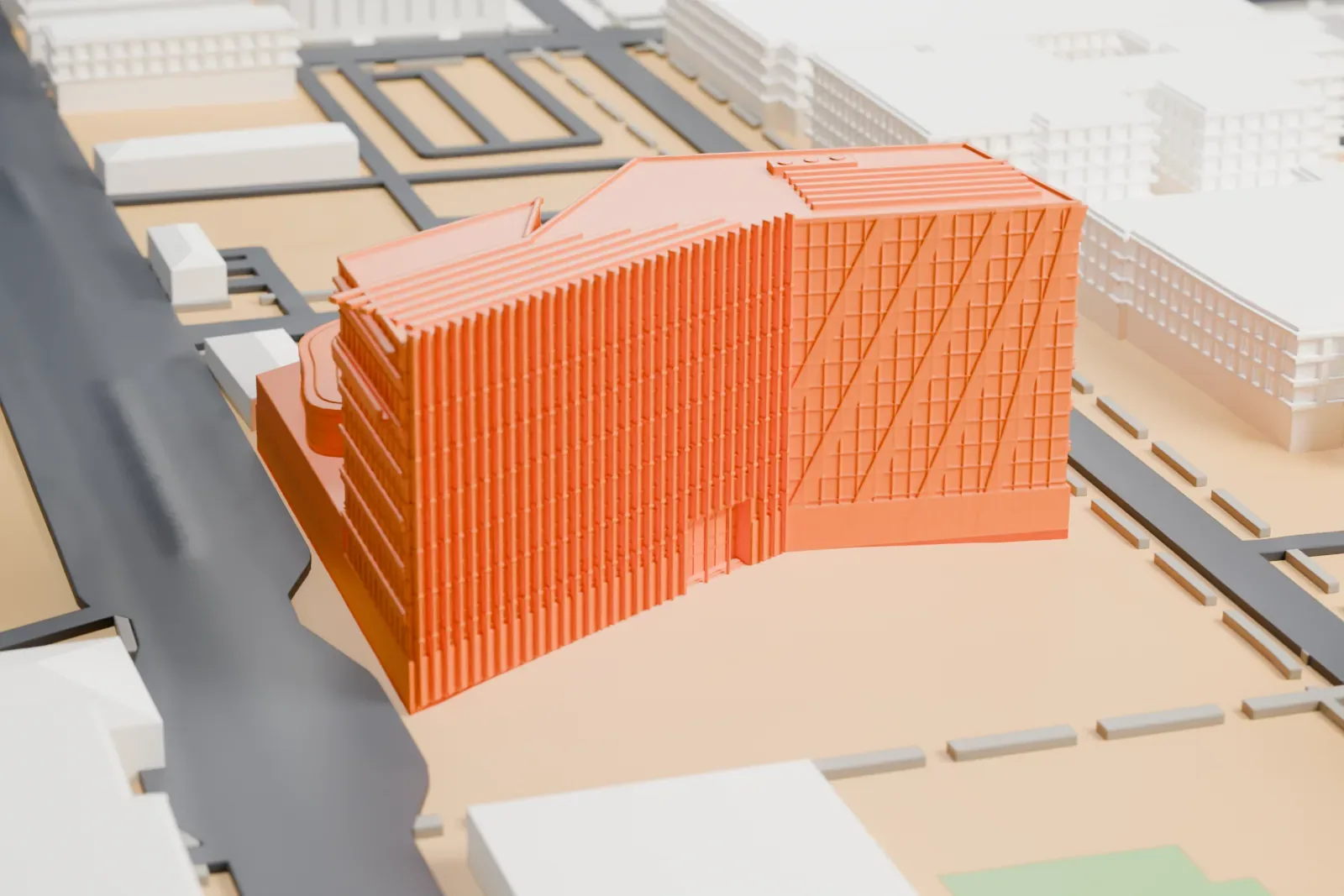 A white 3D print of Las Vegas City Hall, an angular building with a low curved roof beside it, standing on open lots next to roads and low buildings.