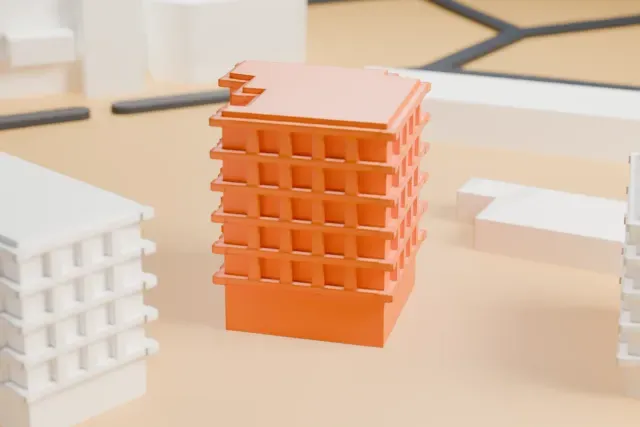 A white 3D print of the LOCALiQ Digital Center, Las Vegas Motor Speedway model in Las Vegas, with the streets around it.