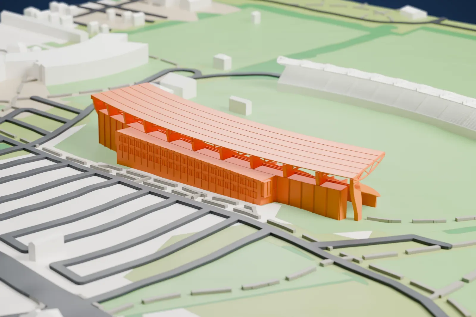 A white 3D print of Laugardalsvöllur, two roofed grandstands facing each other across an oval field, with green parkland, roads and a large curved building nearby.