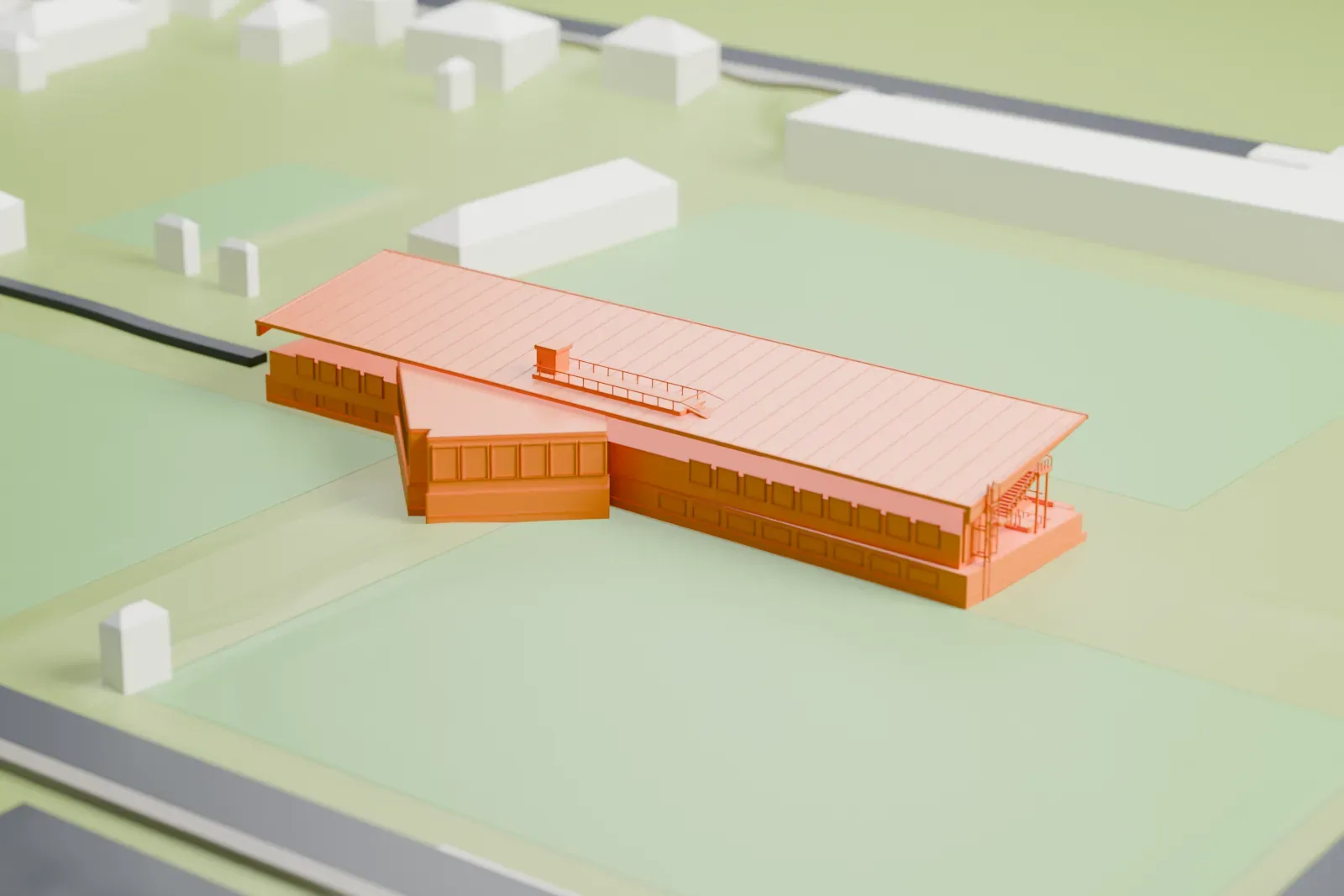 A white 3D print of the Lavanttal-Arena grandstand, a compact stand with a patterned roof, among surrounding fields and buildings.