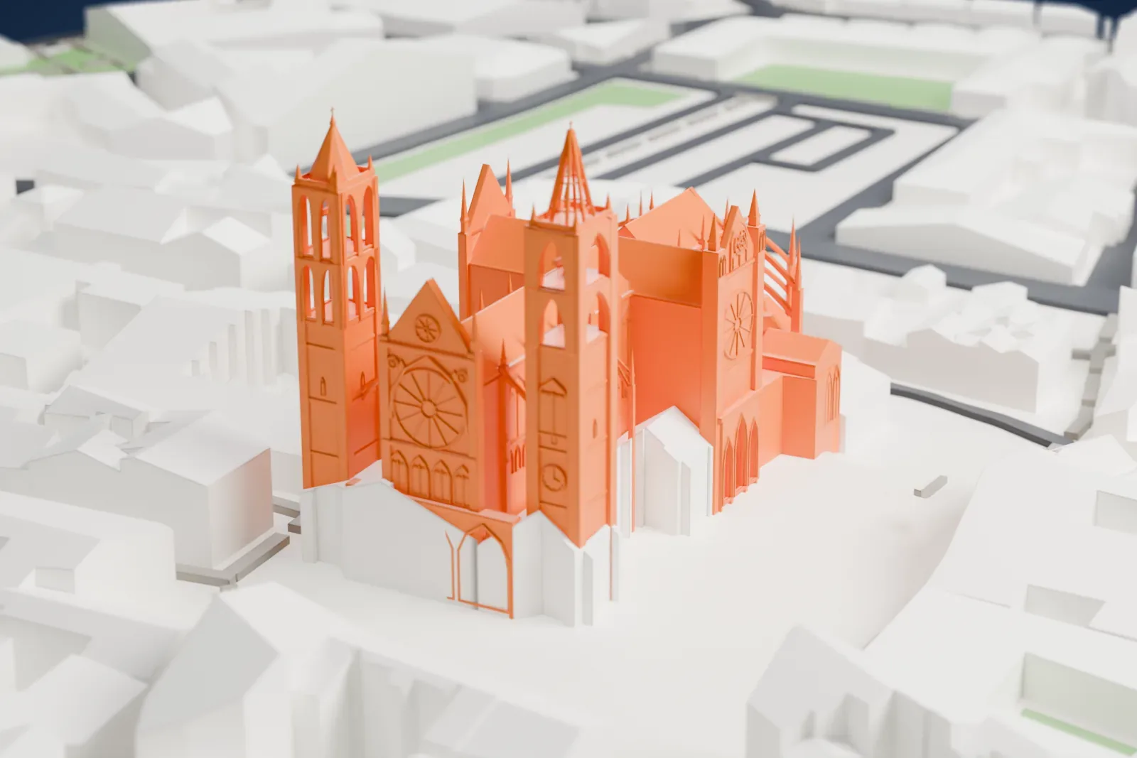 A white 3D print of the León Cathedral with two pointed towers and curved buttresses beside an open square, surrounded by streets and low buildings.