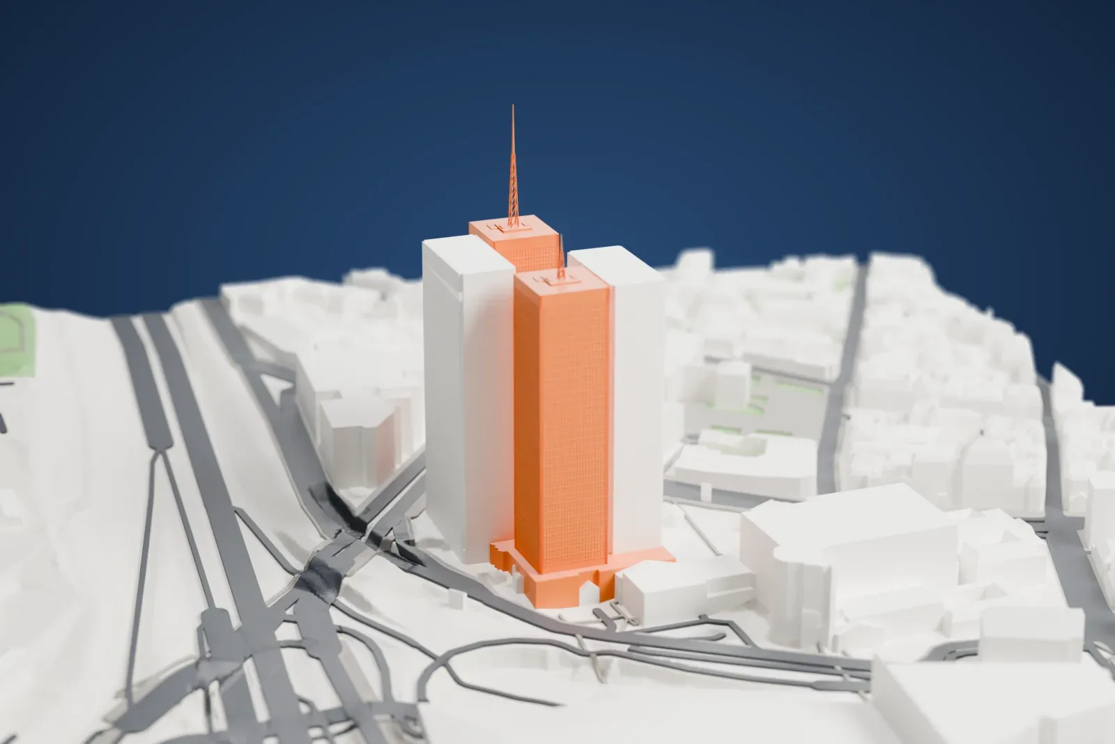 A white 3D print of Les Mercuriales, two tall office towers standing beside the Boulevard Peripherique among the surrounding buildings.