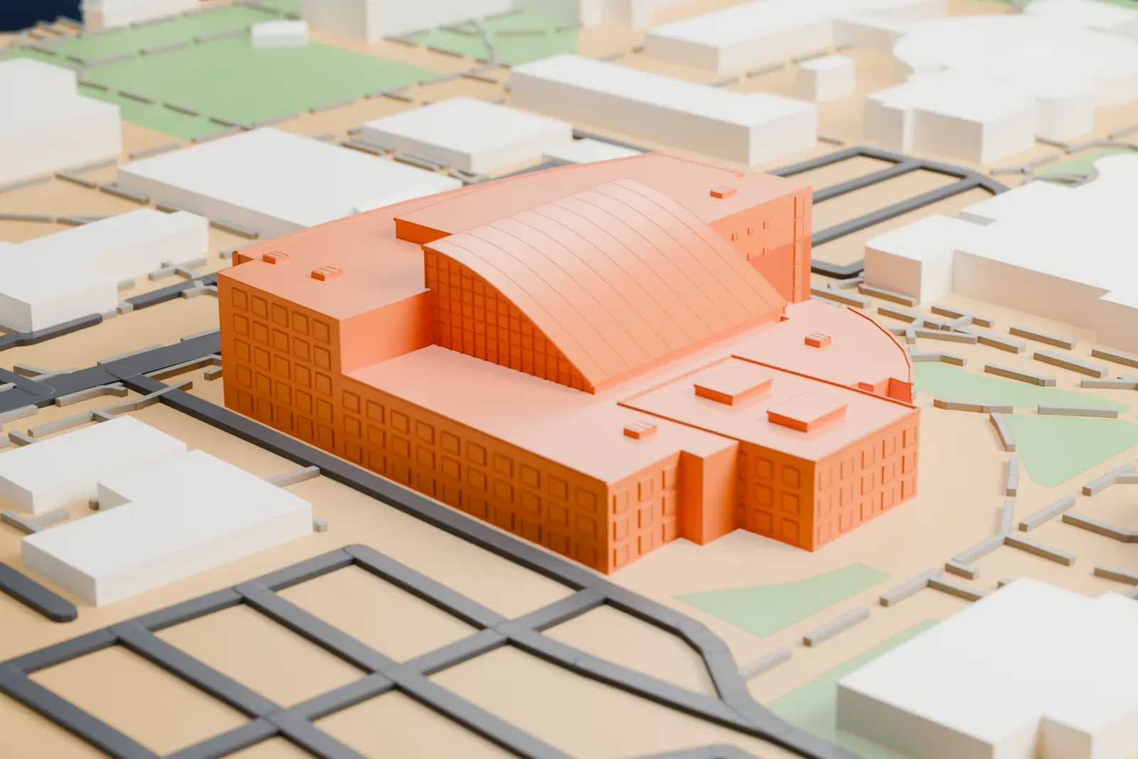 A white 3D print of Lied Library, a five-floor building with a long curved ribbed roof section, standing on a campus with roads, paths and nearby buildings.