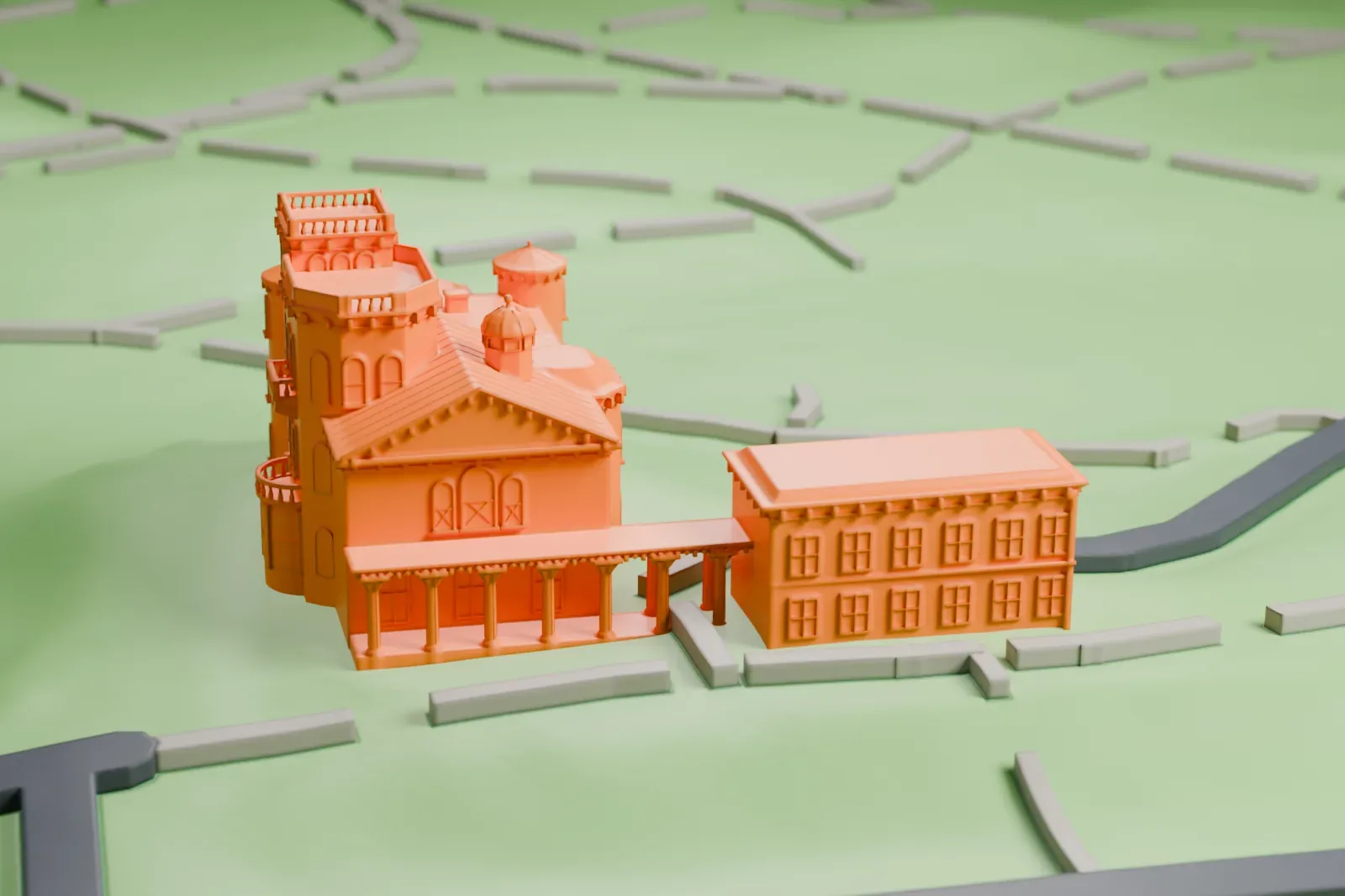 A white 3D print of Litchfield Villa, an Italianate mansion with a square tower and round turrets, standing on a grassy hillside with a plain annex beside it.
