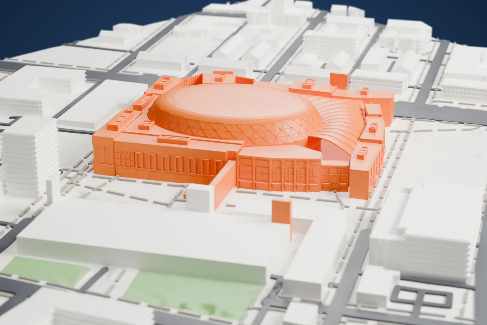 A white 3D print of Little Caesars Arena, a domed arena with a diamond-lattice band around its roof, surrounded by low buildings, streets and open lots.