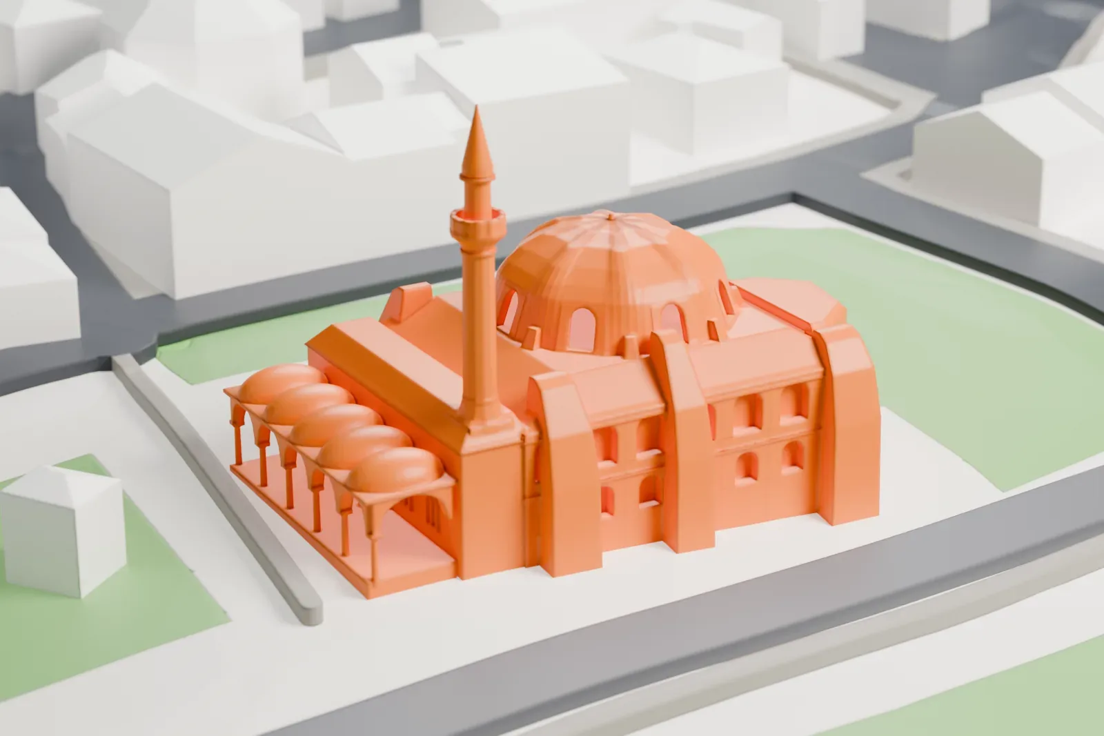A white 3D print of the Little Hagia Sophia, a small building mass on its footprint, with surrounding streets and buildings in Istanbul.