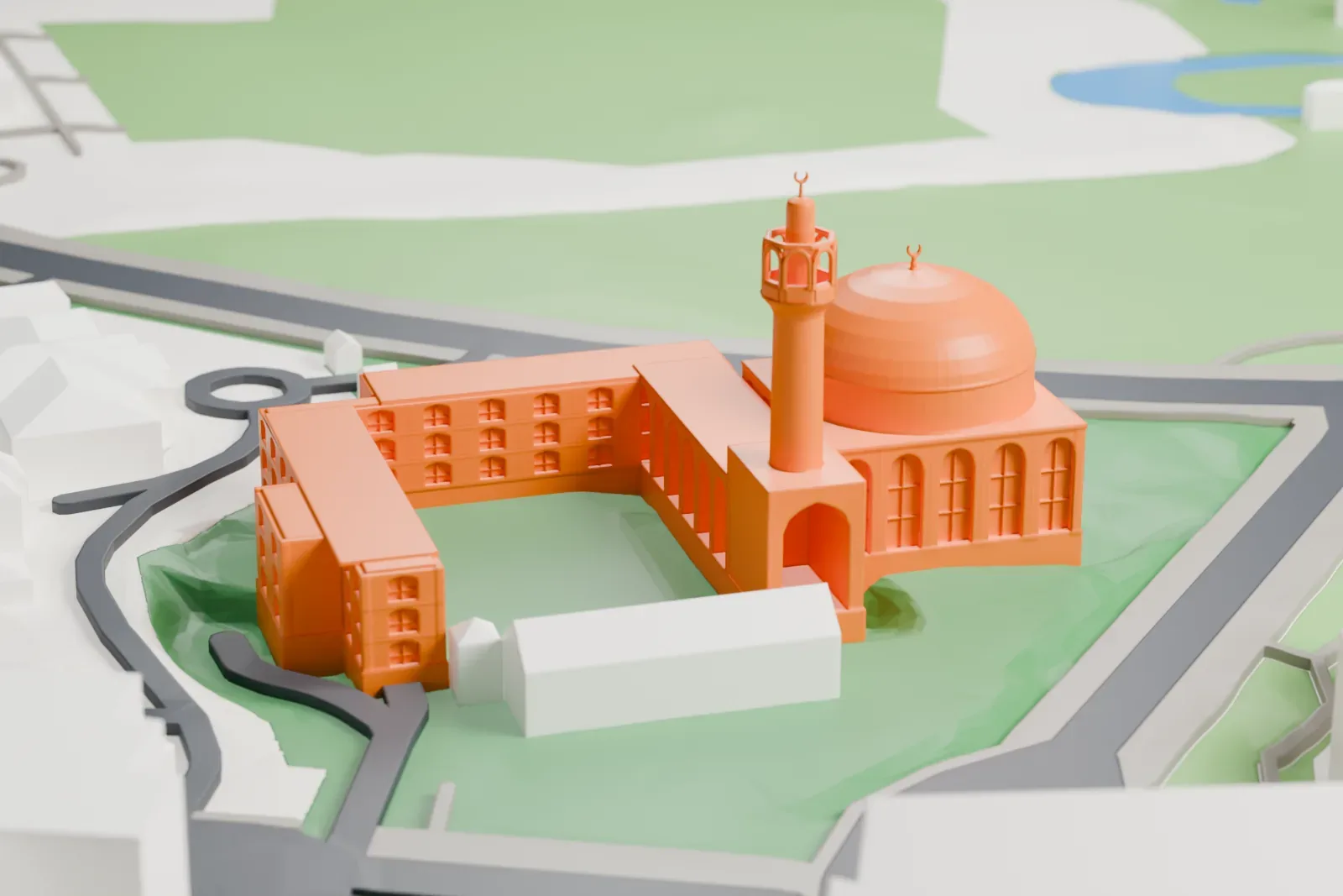 A white 3D print of the London Central Mosque, a domed prayer hall with a minaret, standing among the surrounding city buildings.