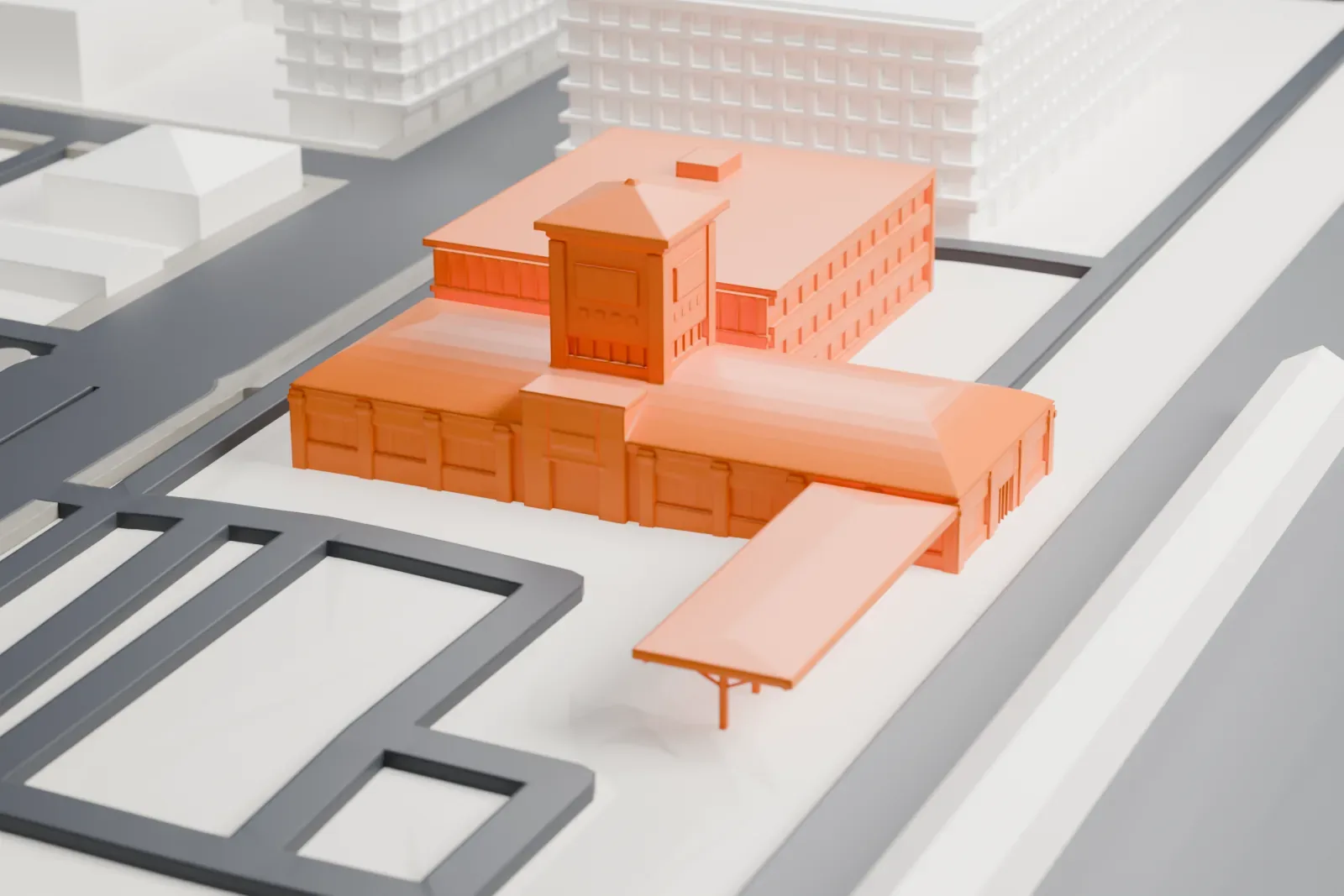 A white 3D print of London station, a railway station, among the surrounding streets and buildings.