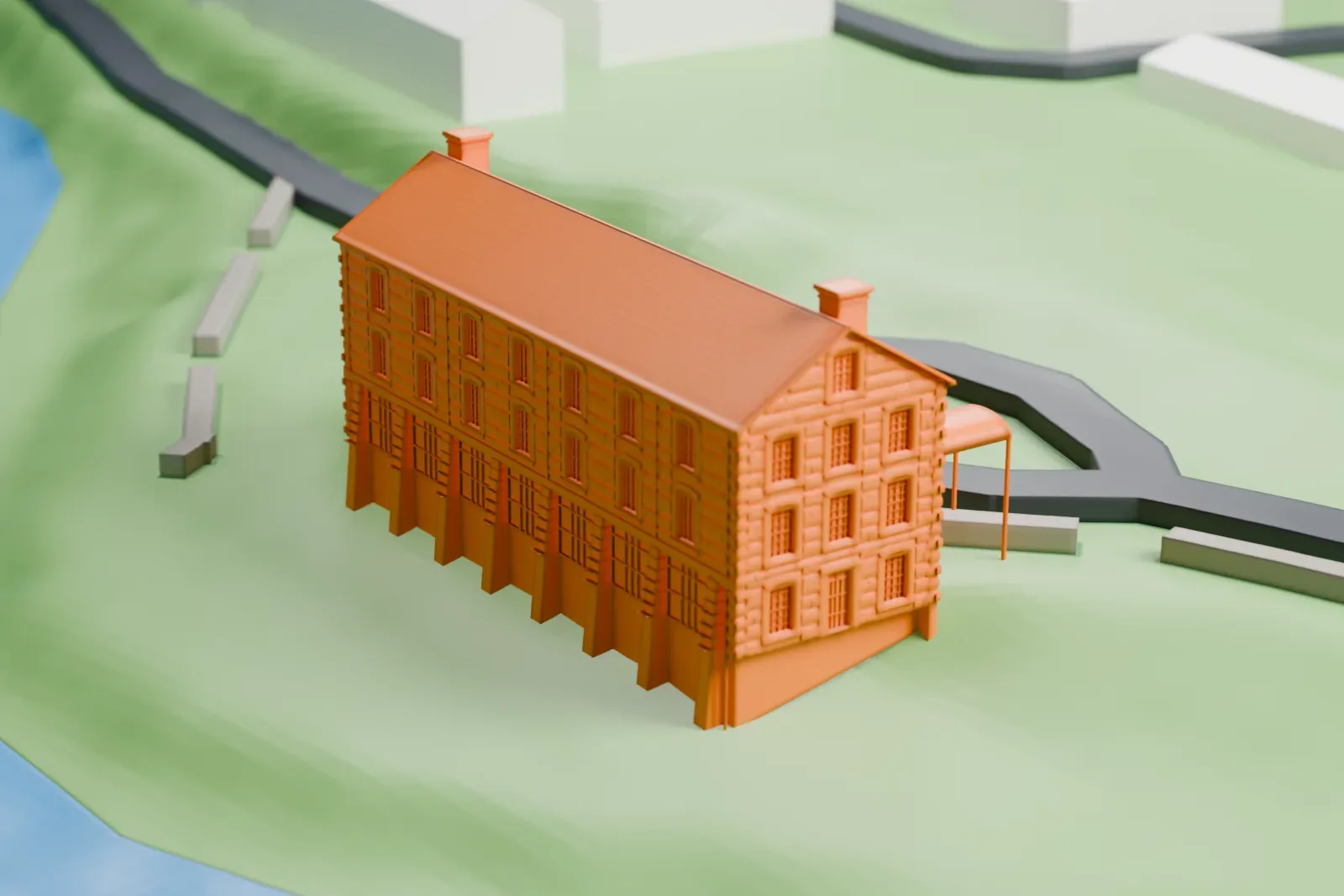 A white 3D print of the Lorillard Snuff Mill, a long gabled building with two chimneys, beside the Bronx River with green grounds around it.