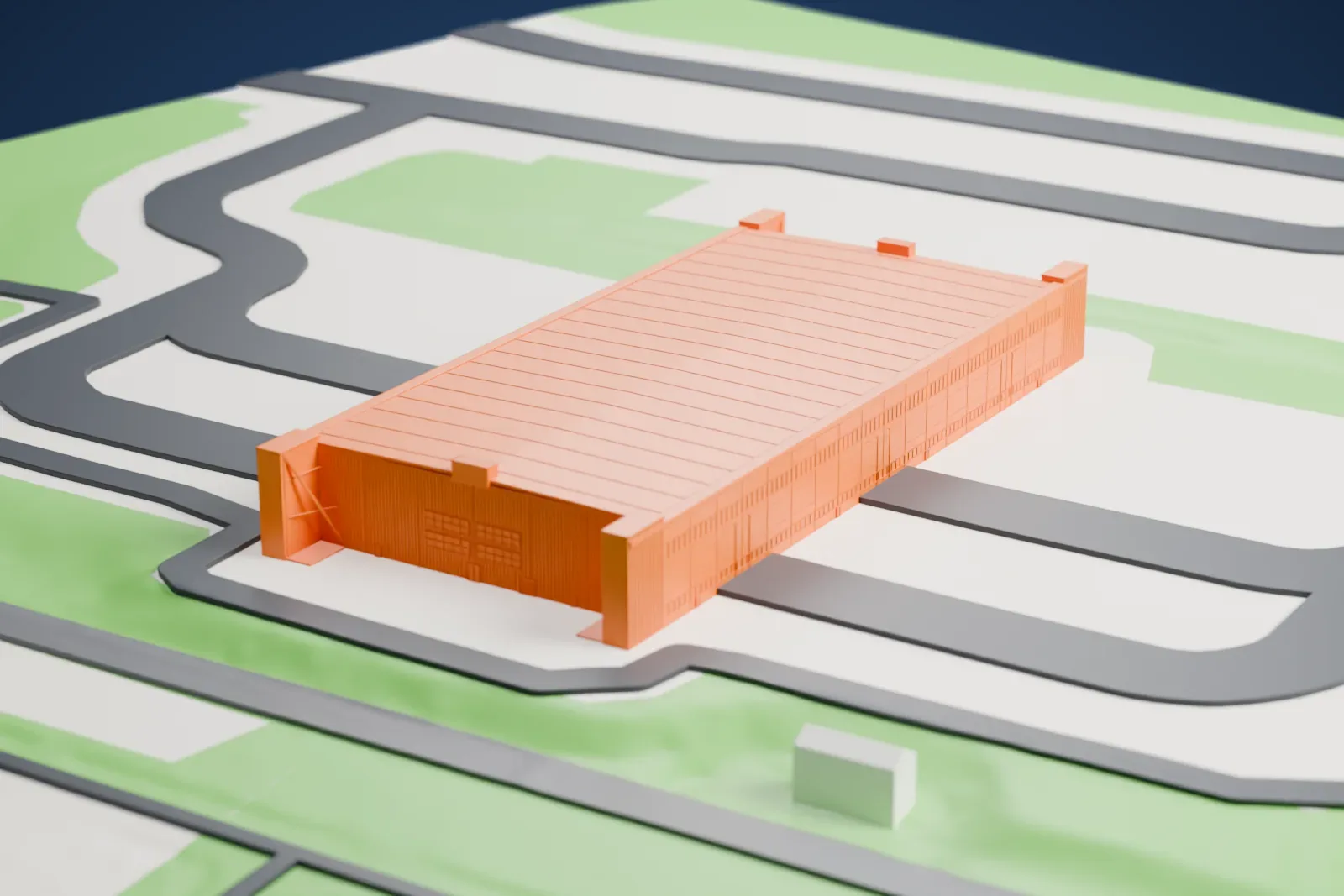 A white 3D print of the Loring double cantilever hangar, a very long rectangular building with a ribbed roof, standing on a paved apron with grass and roads around it.