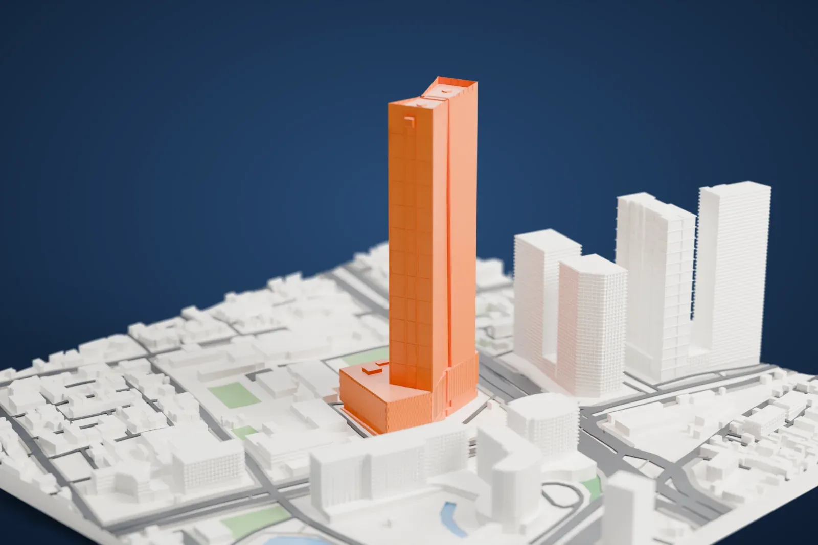 A white 3D print of Lotte Center Hanoi, a tall tower with a vertical notch and slanted tops rising from a wide podium, among surrounding buildings.