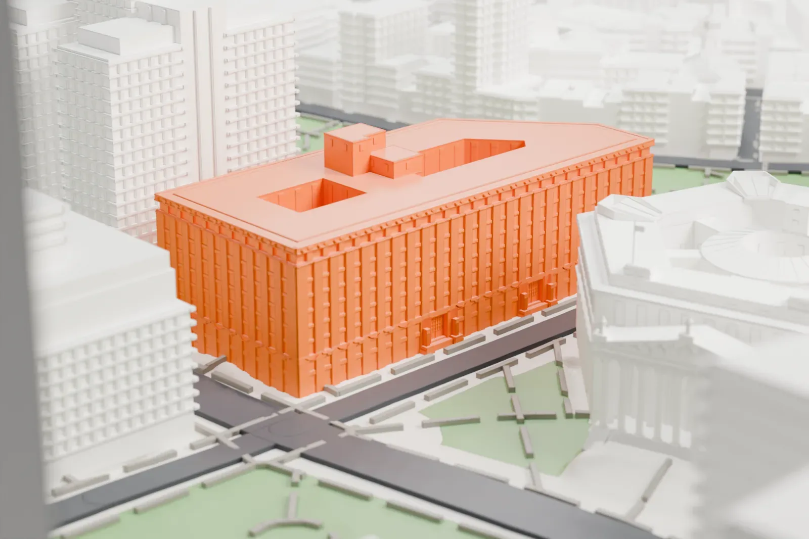 A white 3D print of the Louis J. Lefkowitz Building, a broad block with a notched roof outline, standing among tall towers and small parks.