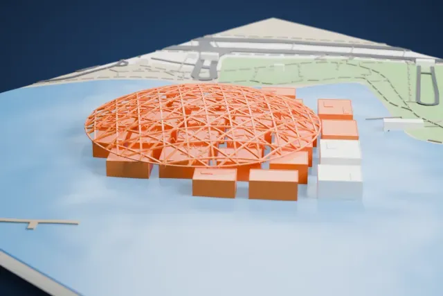 A white 3D print of the Louvre Abu Dhabi, a wide open-lattice dome over a cluster of boxy galleries, standing in water beside a green shoreline with paths and roads.
