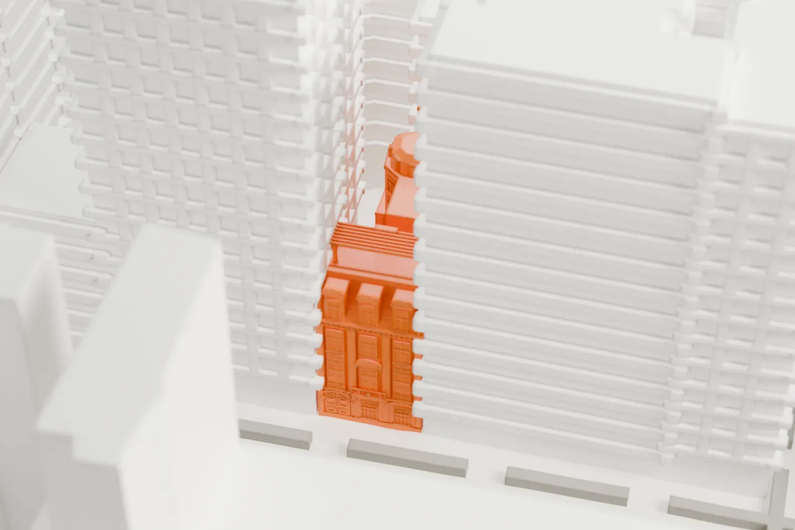 A white 3D print of the Lucy Drexel Dahlgren House, a narrow house with a sloped roof and dormers, tucked between much taller buildings.