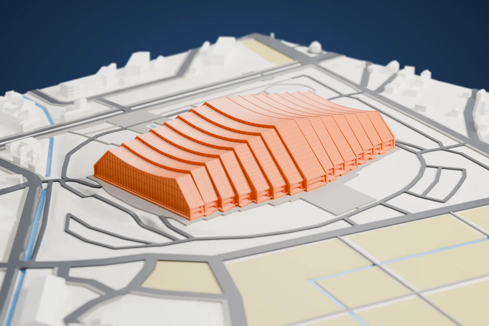 A white 3D print of M-Wave, a wide arena with a wave-shaped roofline of tall segments, among surrounding roads and fields.