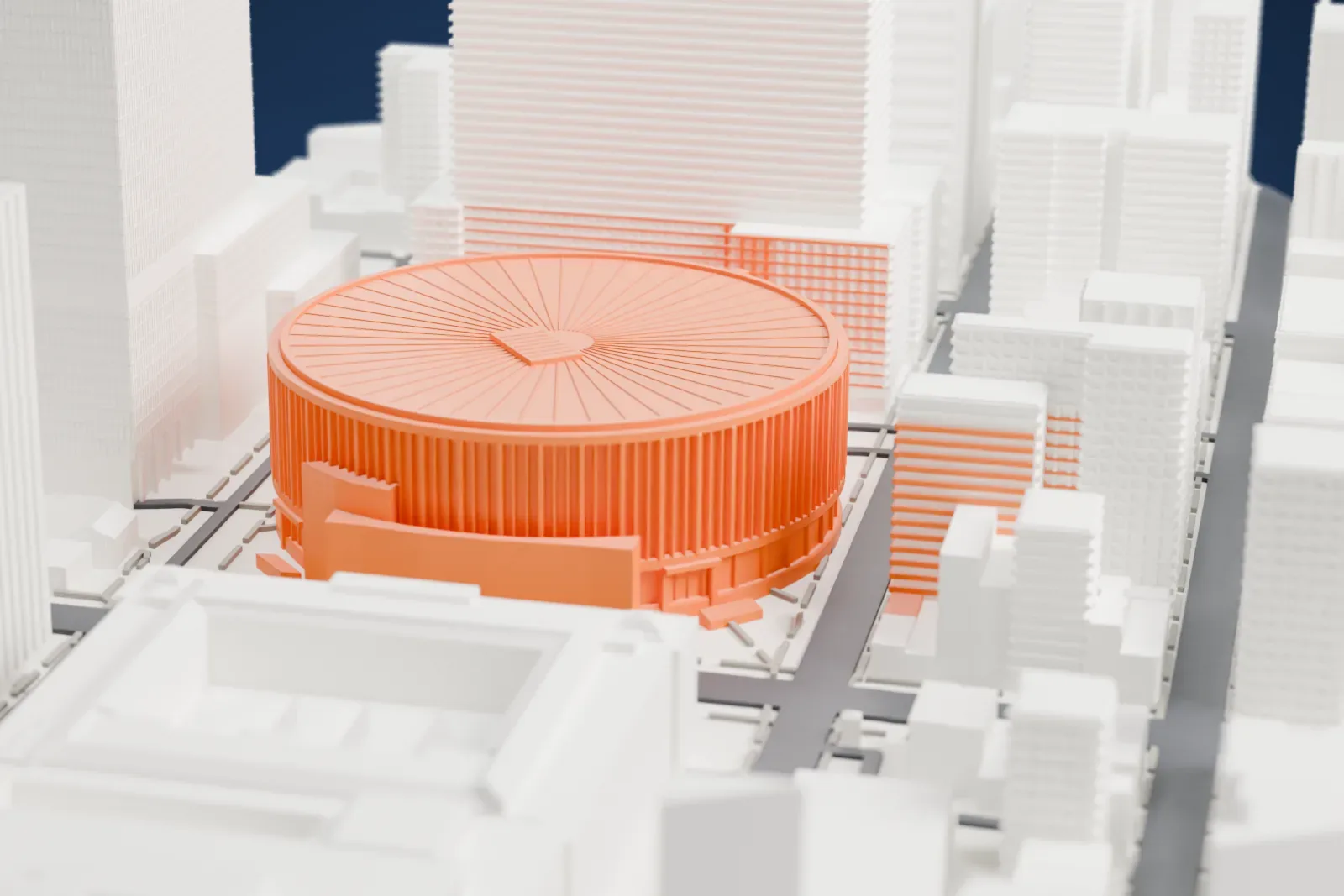 A white 3D print of Madison Square Garden, a round arena with a spoke-ribbed roof and a ring of vertical columns, hemmed in by tall Midtown towers.