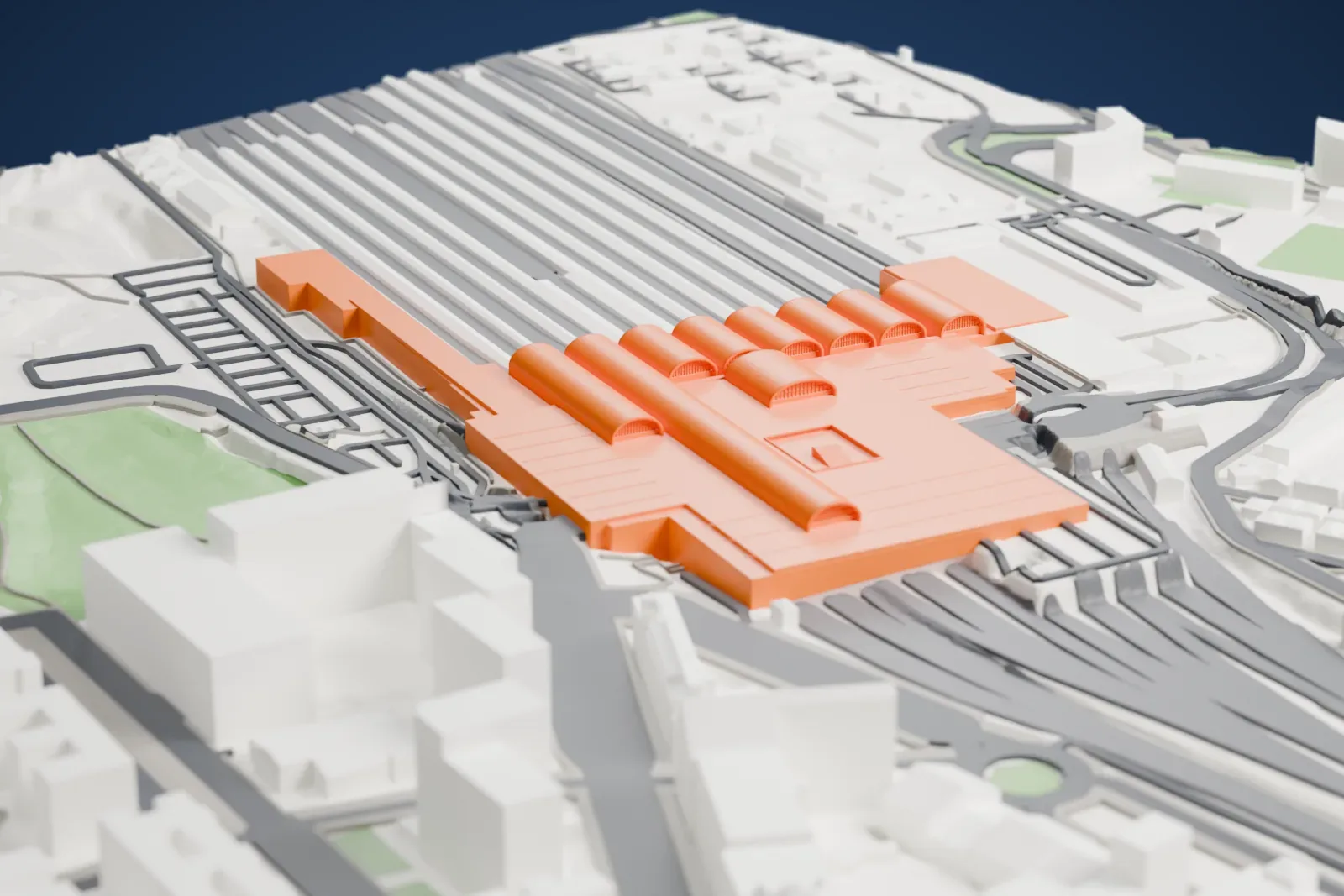 A white 3D print of the Madrid-Chamartín-Clara Campoamor railway station in northern Madrid, with the surrounding streets and buildings.