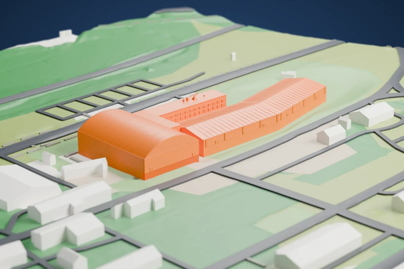 A white 3D print of the Swedish Air Force Museum's aircraft halls, a long, low, bent building with ridged roofs and a barrel-roofed hall at one end, surrounded by green fields, roads and a few small buildings.