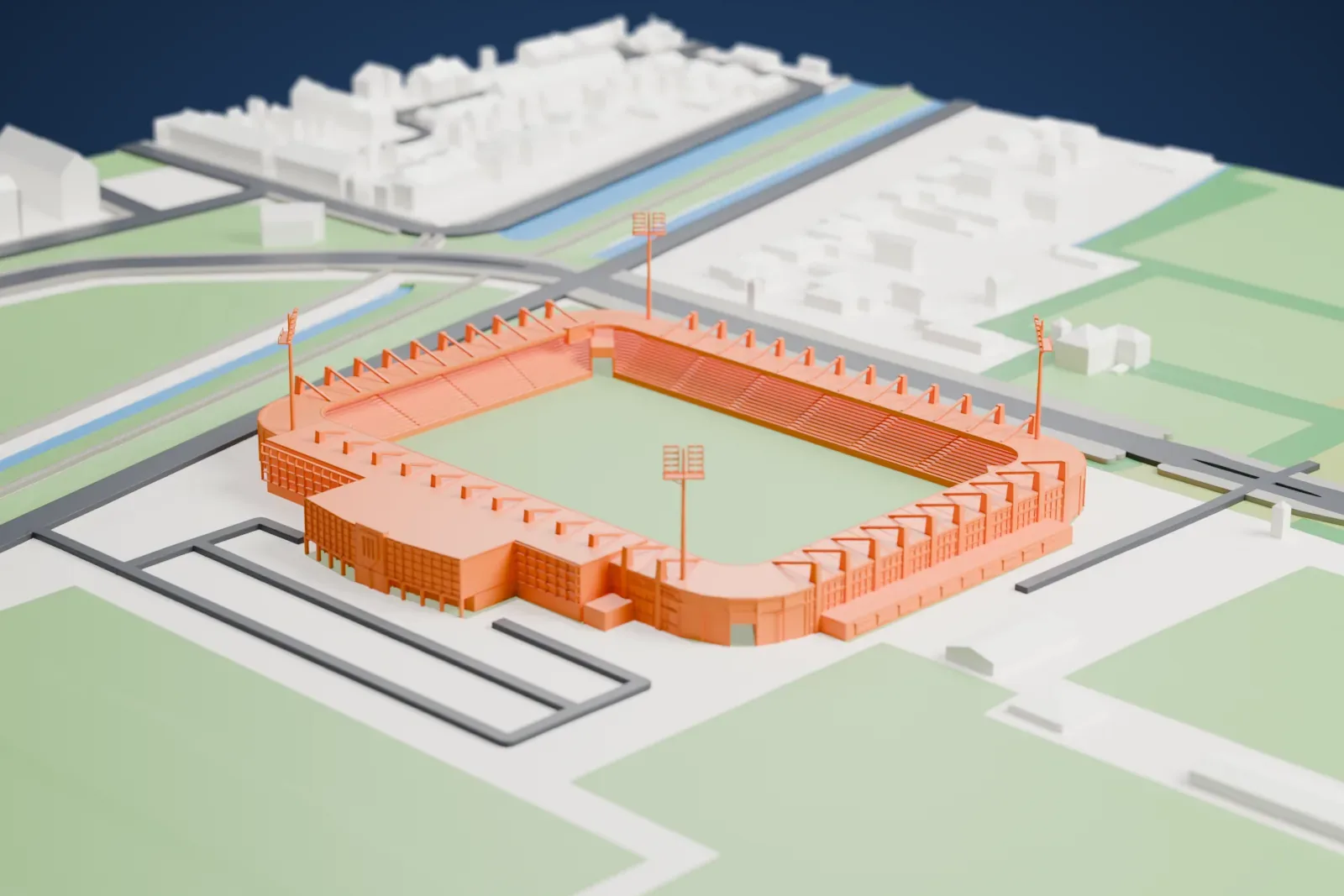 A white 3D print of the Mandemakers Stadion, a compact stadium with four tall floodlight masts around a green pitch, among surrounding roads, fields and green areas.