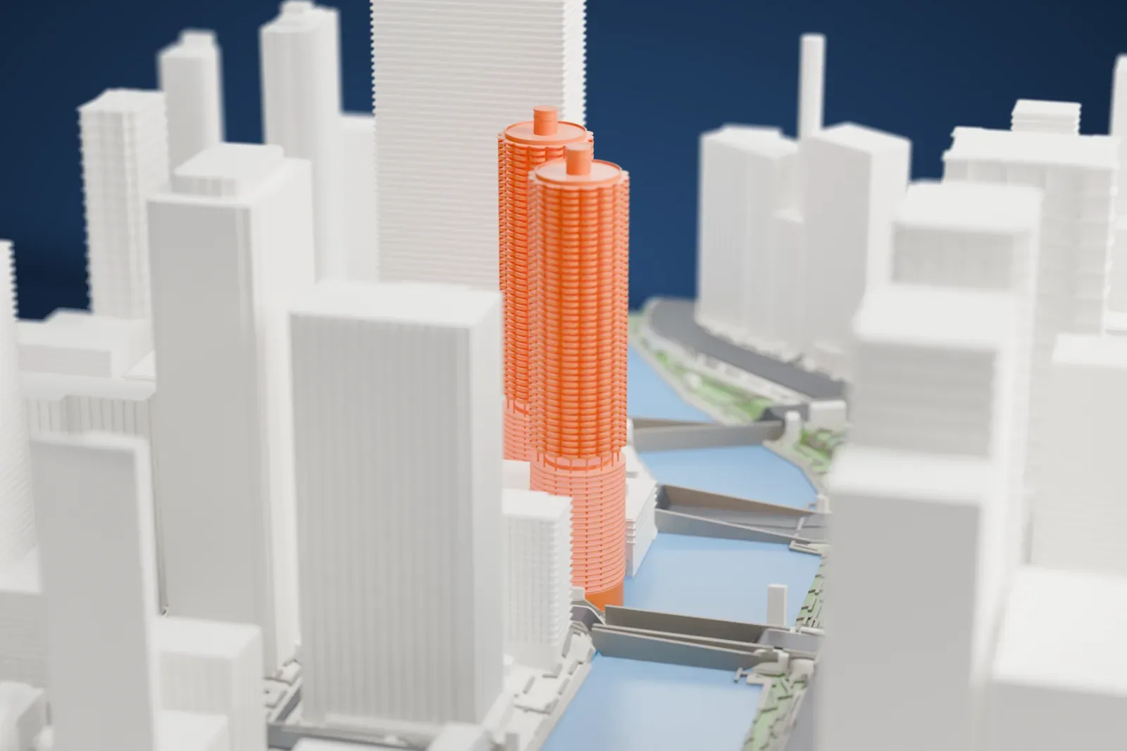 A white 3D print of Marina City, two tall round towers with scalloped balcony floors and a ramped base, beside a river with bridges and tall downtown buildings around them.