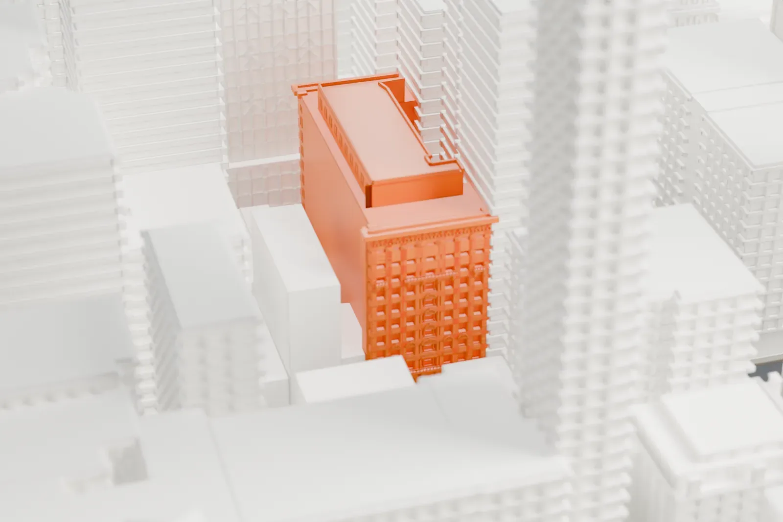 A white 3D print of the Martha Washington Hotel, a long stepped block with a decorated cornice, set between much taller buildings.