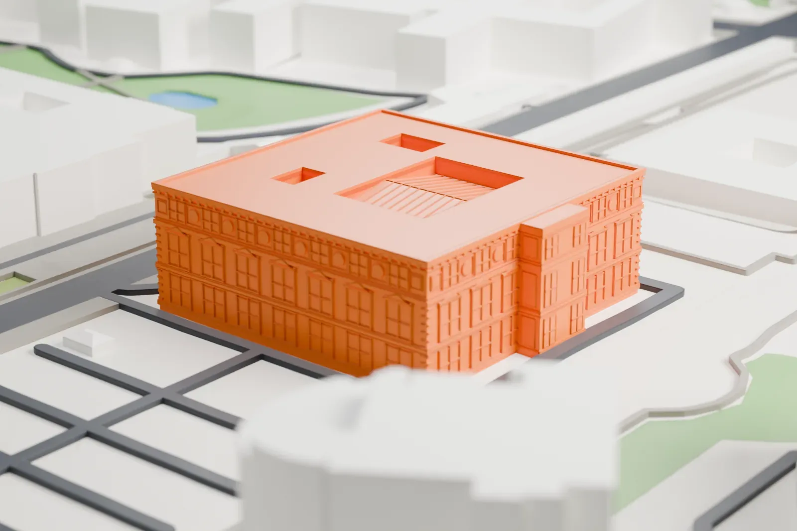 A white 3D print of Martin-Gropius-Bau among the surrounding city buildings.