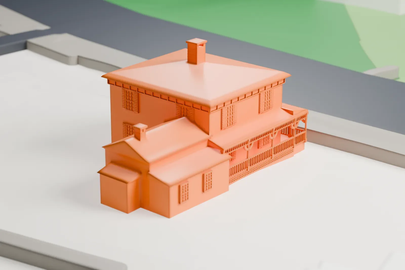 A white 3D print of the Marvin Tavern, a two-and-a-half-story house with a hip roof, a central chimney and a spindled porch, with lower wings at the back and open ground around it.