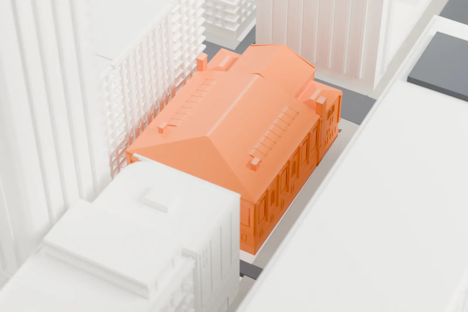 A white 3D print of Massey Hall in Toronto, with the surrounding streets and buildings.