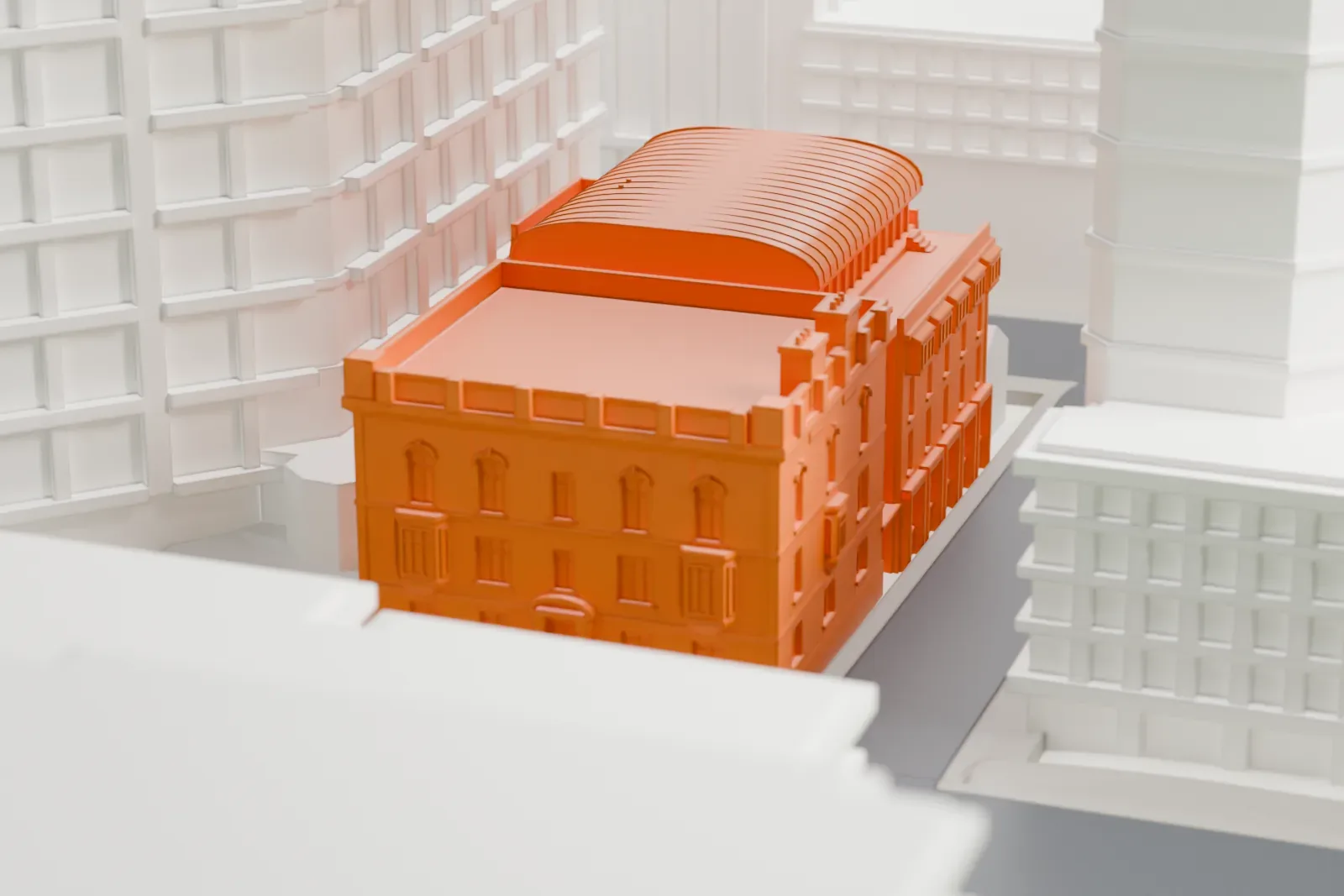 A white 3D print of the McCord Stewart Museum with the surrounding streets and buildings of downtown Montreal.