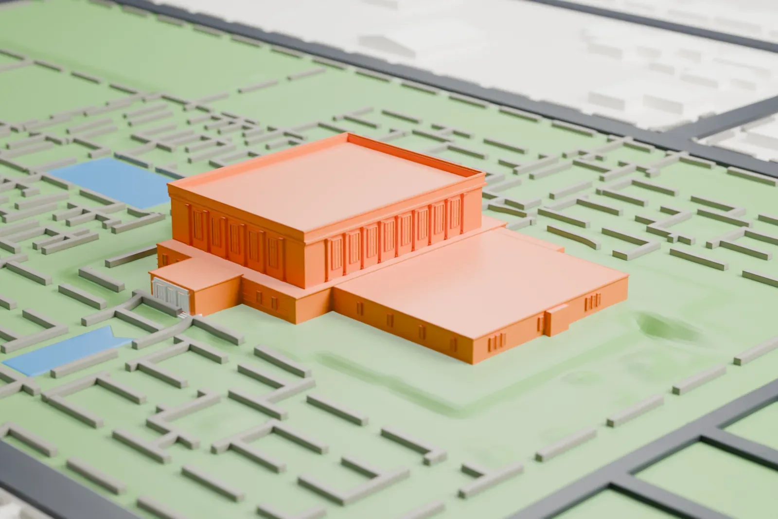 A white 3D print of the Mesa Arizona Temple, a long, low, flat-roofed building with attached wings, set in a green garden with thin paths, small pools and streets around it.
