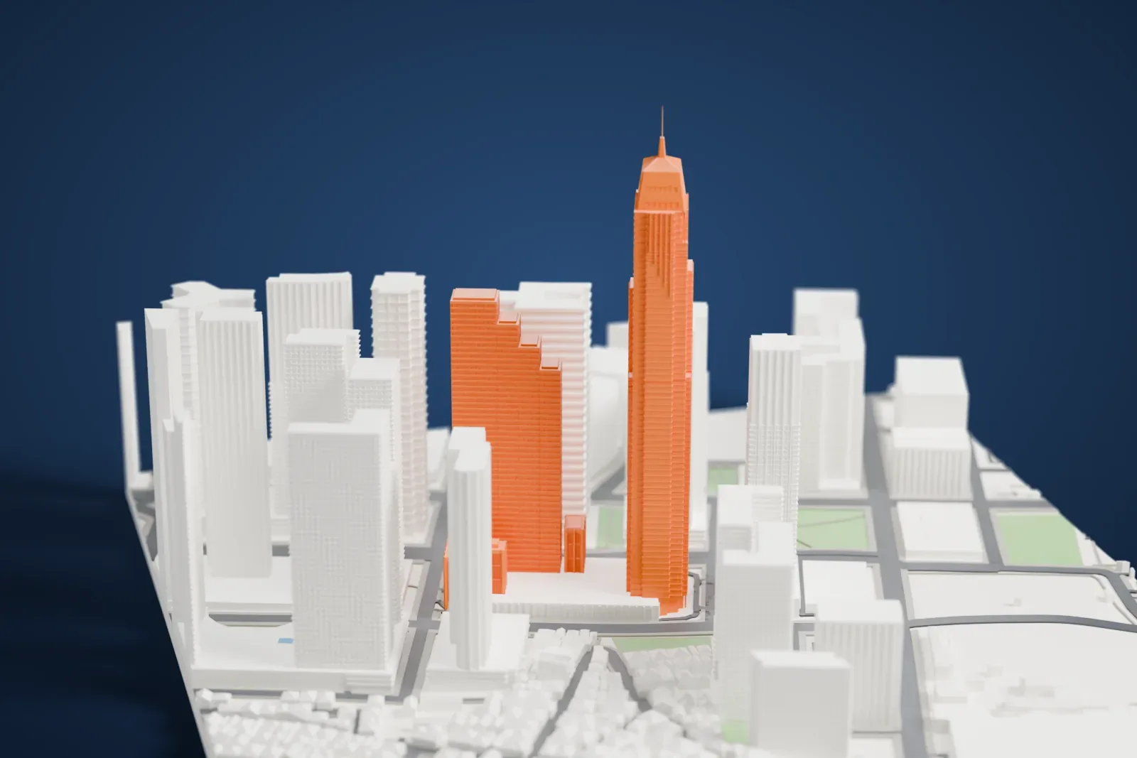 A white 3D print of the Metrobank Center, a tall tower with a stepped crown and mast rising above its podium and the surrounding city.