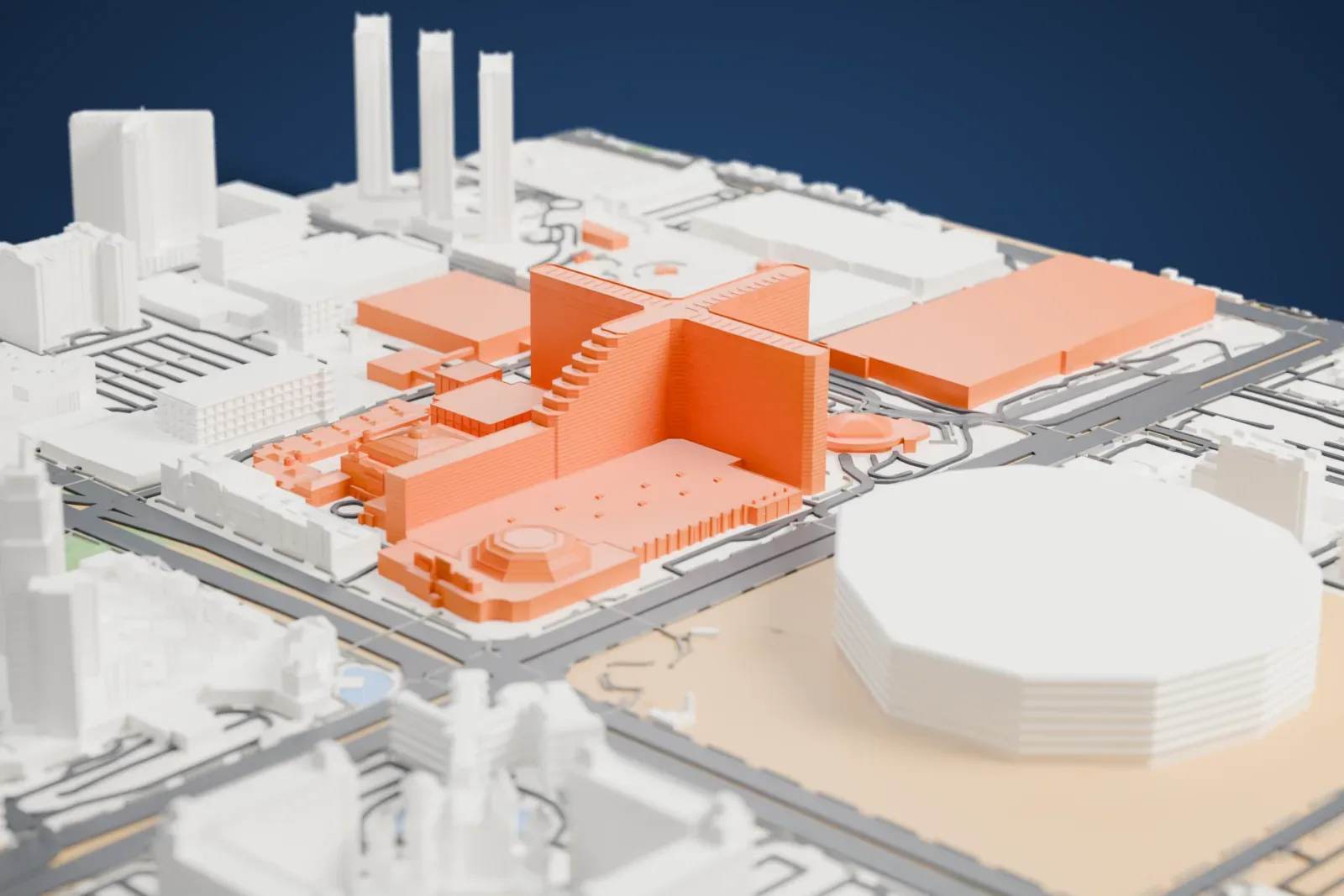 A white 3D print of the MGM Grand Las Vegas, a wide, flat-topped resort block with a stepped dome at one end, among streets, taller towers and a large round building.