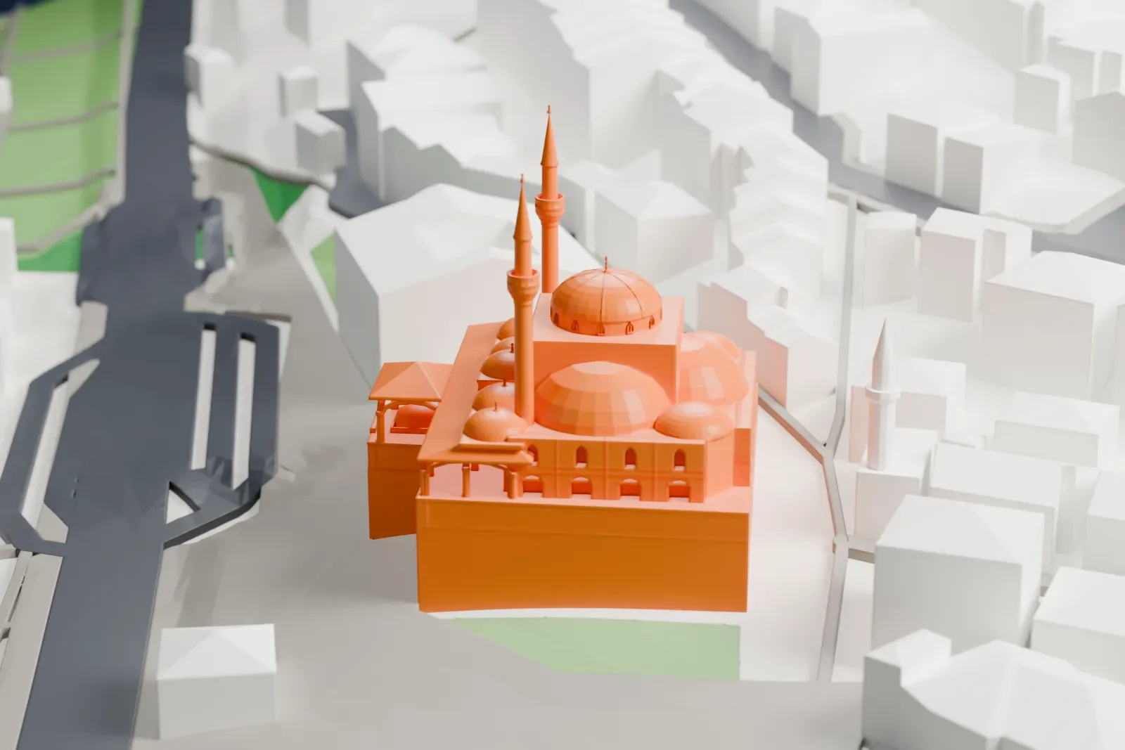 A white 3D print of the Mihrimah Sultan Mosque, a domed mosque with slender minarets, among surrounding streets and buildings.