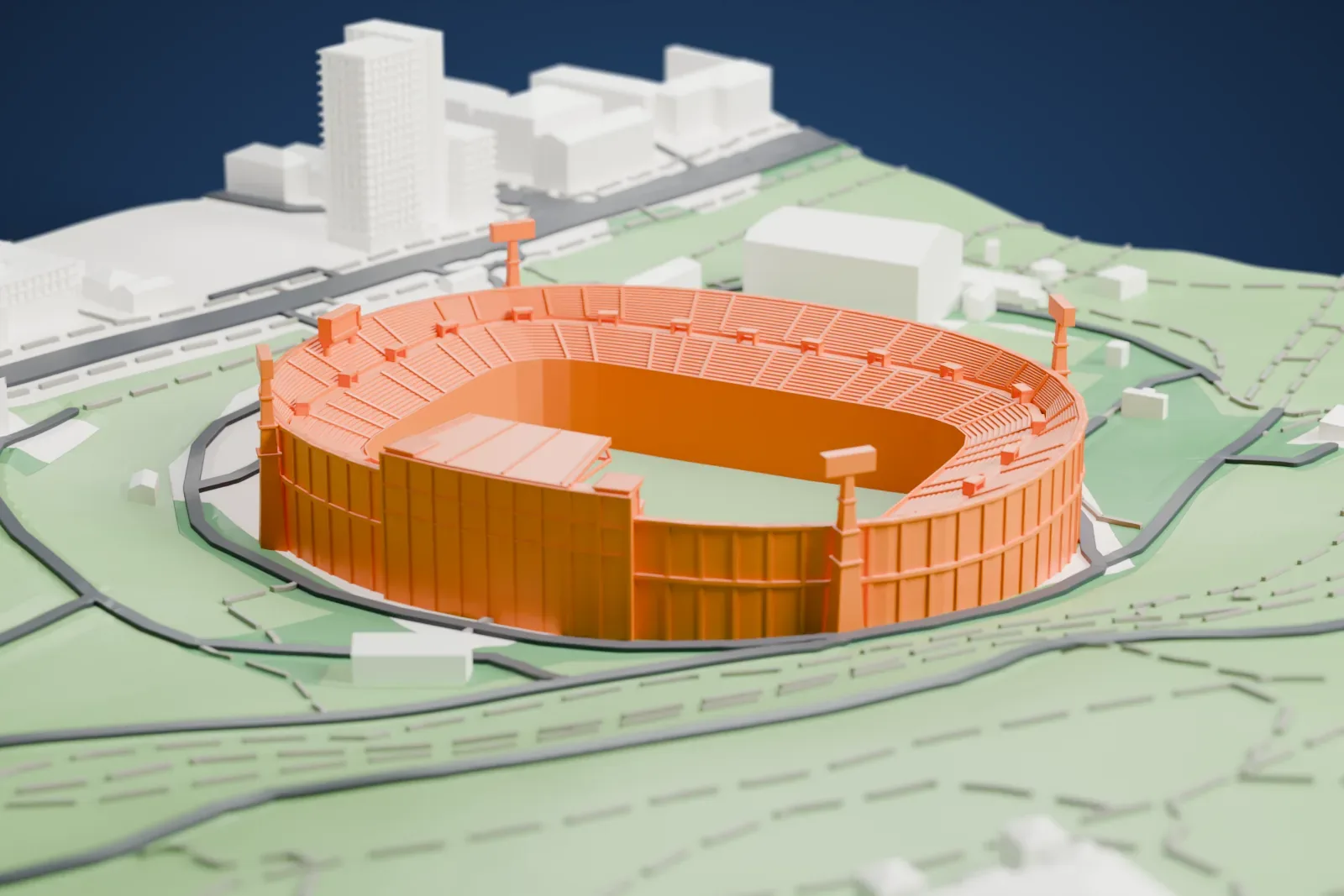 A white 3D print of the Mikheil Meskhi Stadium, an open oval bowl with a single cantilever roof over the main stand and four corner floodlight masts, among the streets and buildings around it.