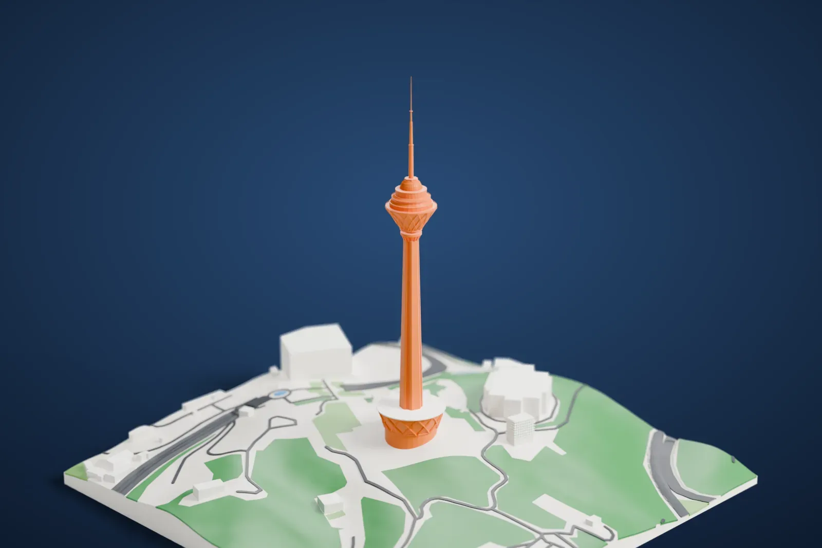 A white 3D print of Milad Tower, a very tall slim shaft carrying a wide pod and a needle-like antenna mast, standing on a round base among green park land and a few buildings.