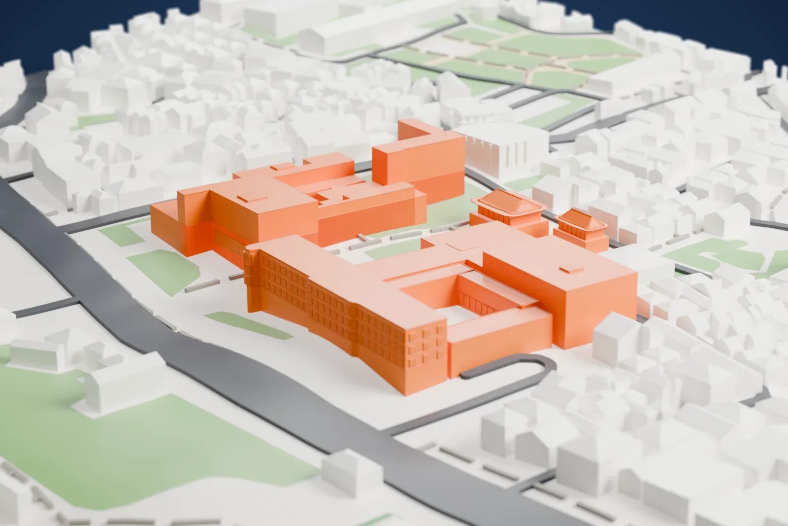 A white 3D print of the MMCA Seoul complex with flat roof blocks, open courtyards, surrounding streets, clustered buildings, and green spaces.