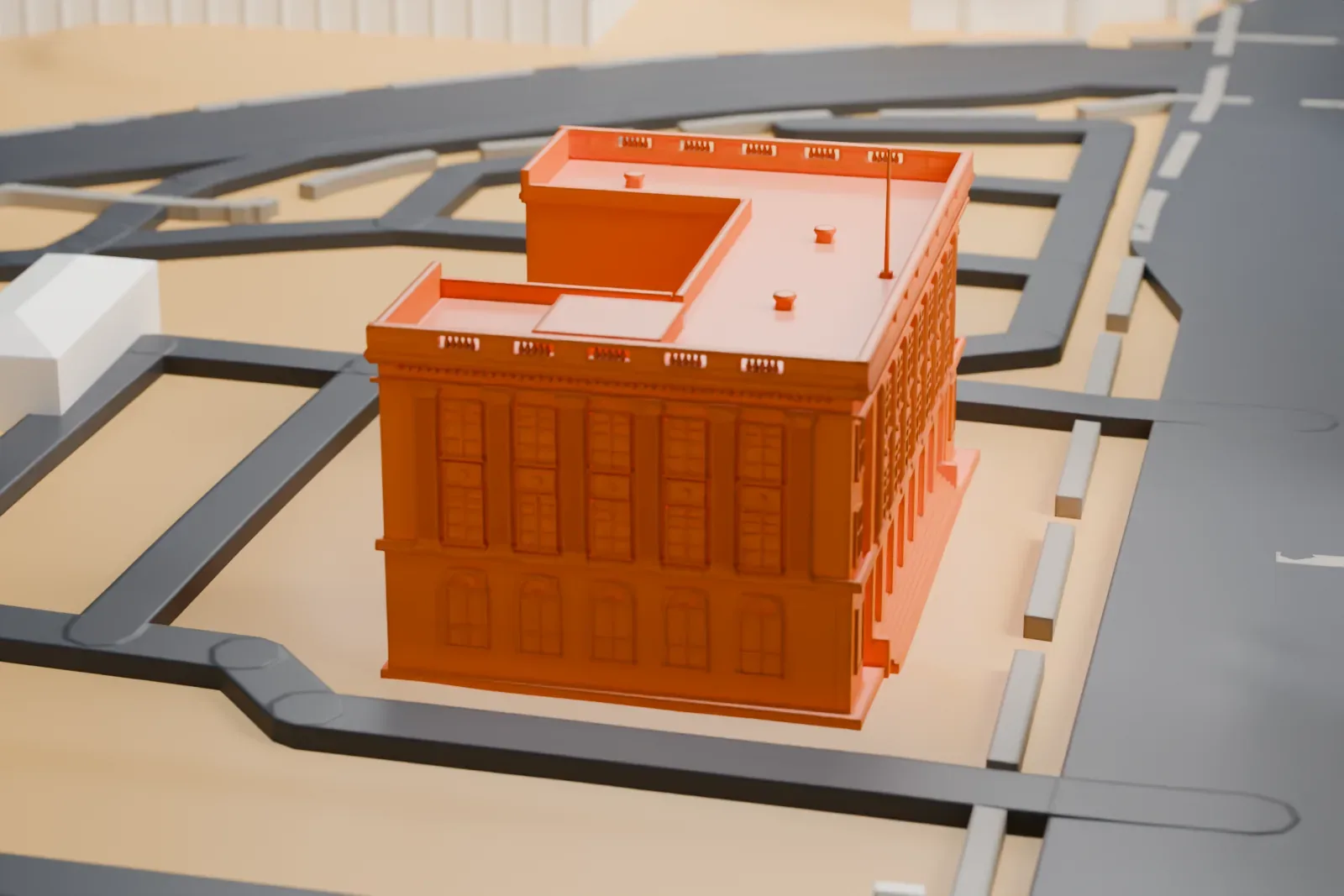 A white 3D print of the Mob Museum, a three-story building with an L-shaped plan, tall windows and a decorated roofline, among downtown streets and taller buildings.