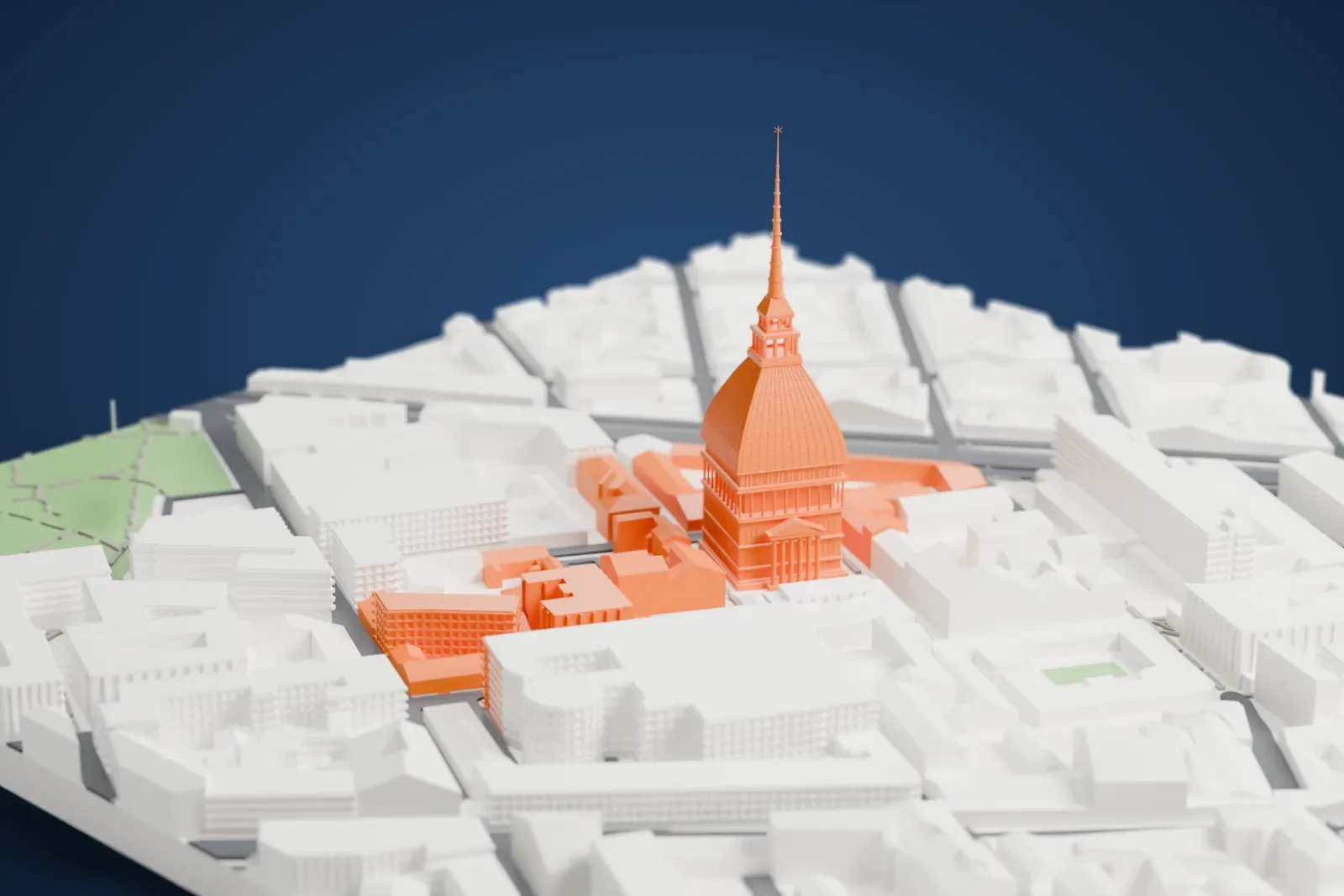A white 3D print of the Mole Antonelliana, a tall domed tower with a very slender spire, standing among the dense gray buildings of Turin.