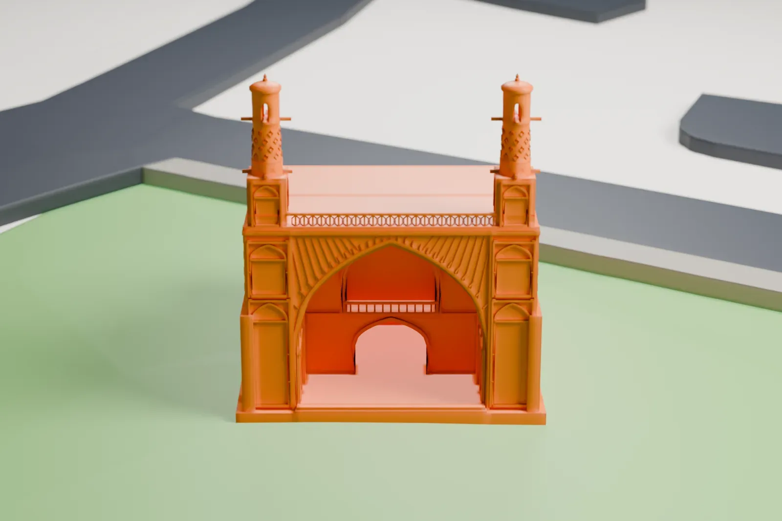A white 3D print of Monar Jonban, a brick mosque and tomb with a large arched front, a low dome and two slender minarets, standing on open ground beside roads.