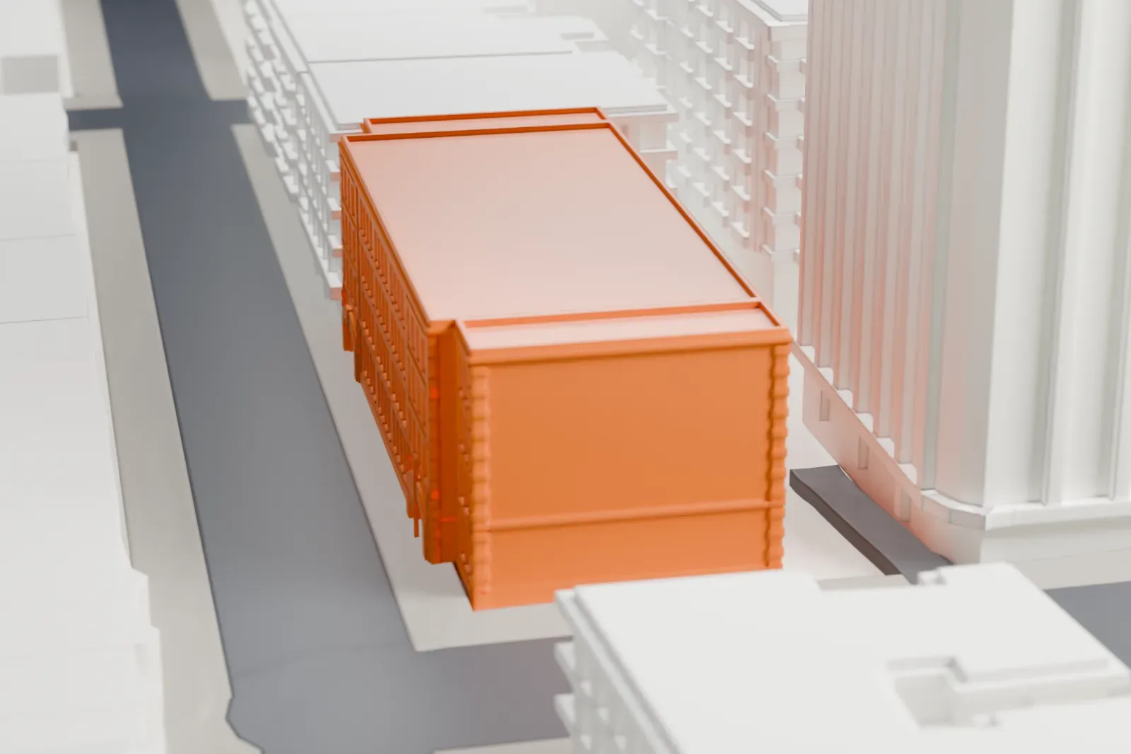A white 3D print of Montréal, arts interculturels, shown among the surrounding streets and buildings.