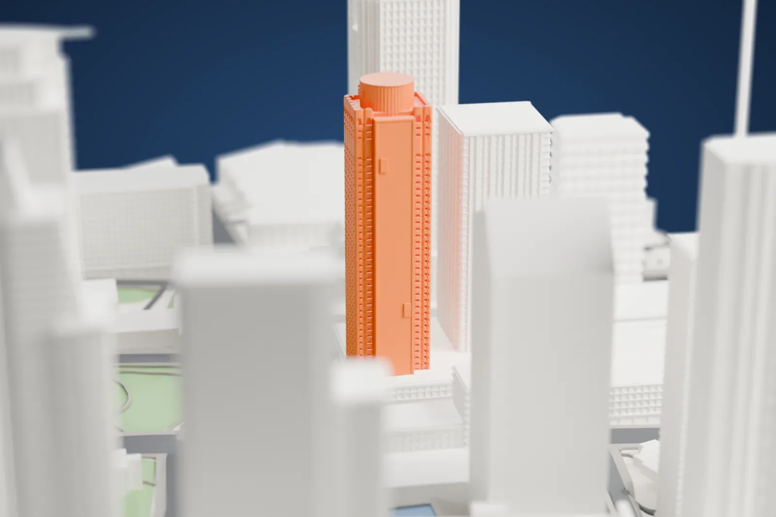 A white 3D print of the Montreal Marriott Château Champlain, a tall hotel tower, among surrounding streets and buildings.
