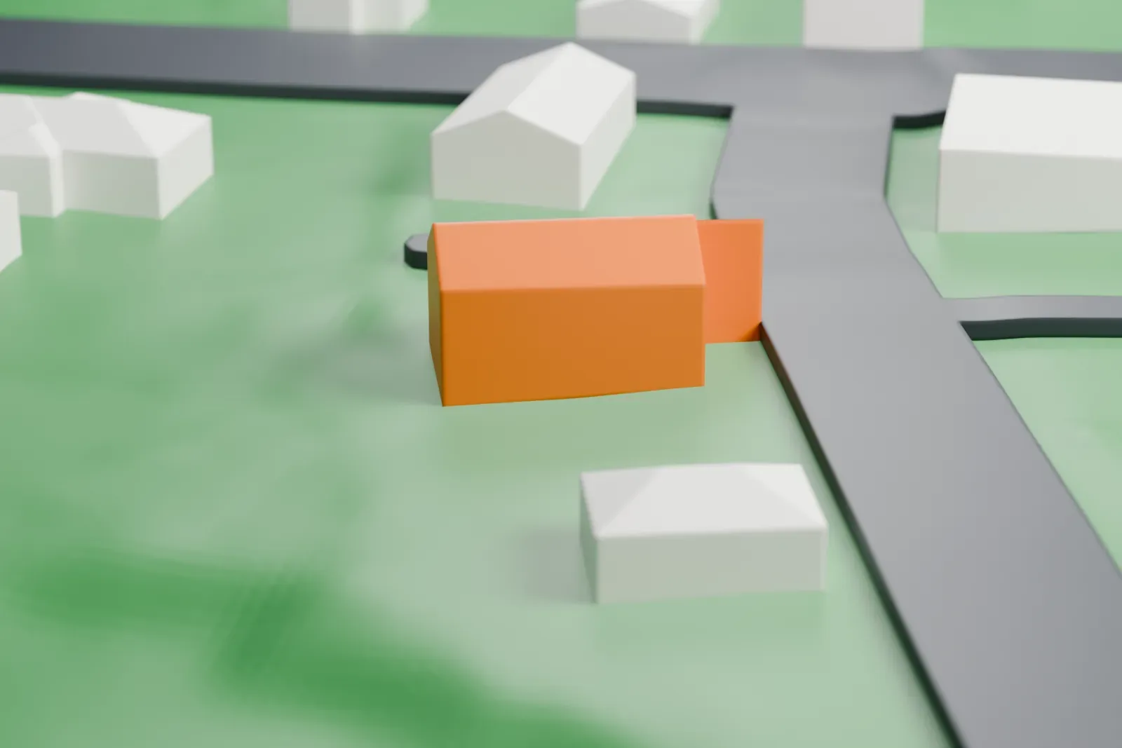 A white 3D print of the Montville Schoolhouse, a small gabled building with a cupola on its roof ridge, beside a road with grassy ground around it.