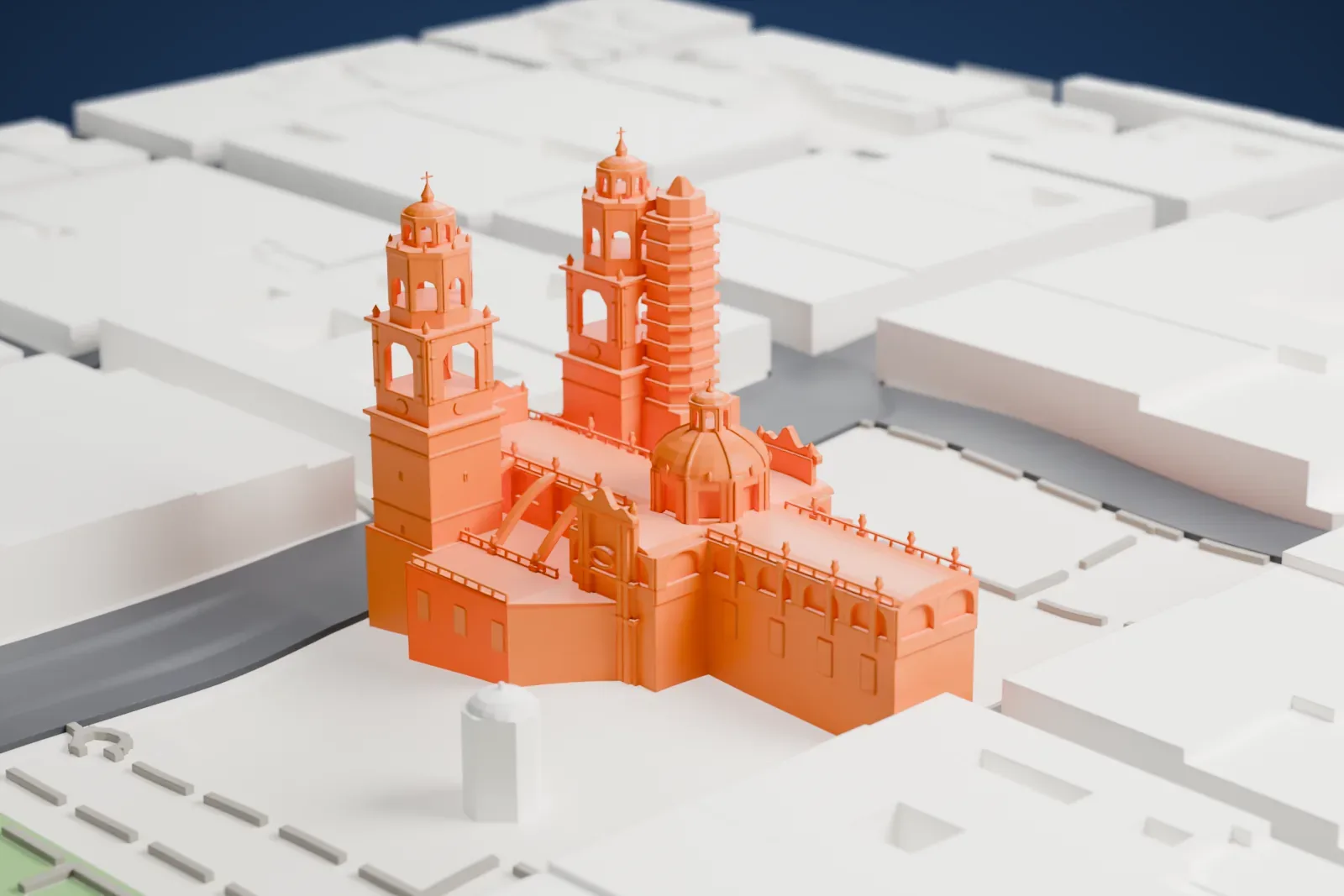A white 3D print of Morelia Cathedral, a church with two tall tiered towers and a ribbed dome, surrounded by city blocks.
