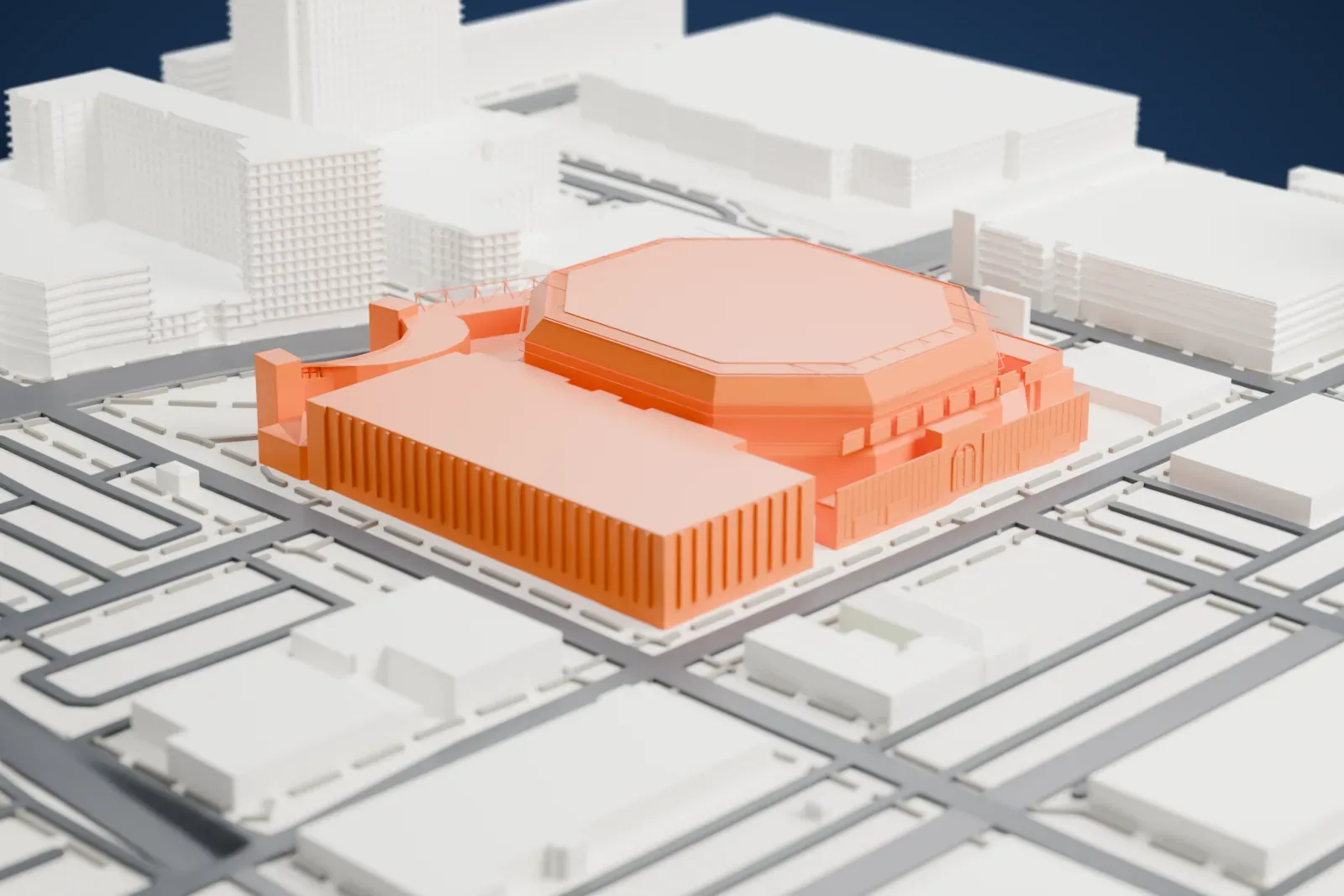 A white 3D print of Mortgage Matchup Center, a low octagonal arena with a broad flat roof, surrounded by downtown streets and buildings.