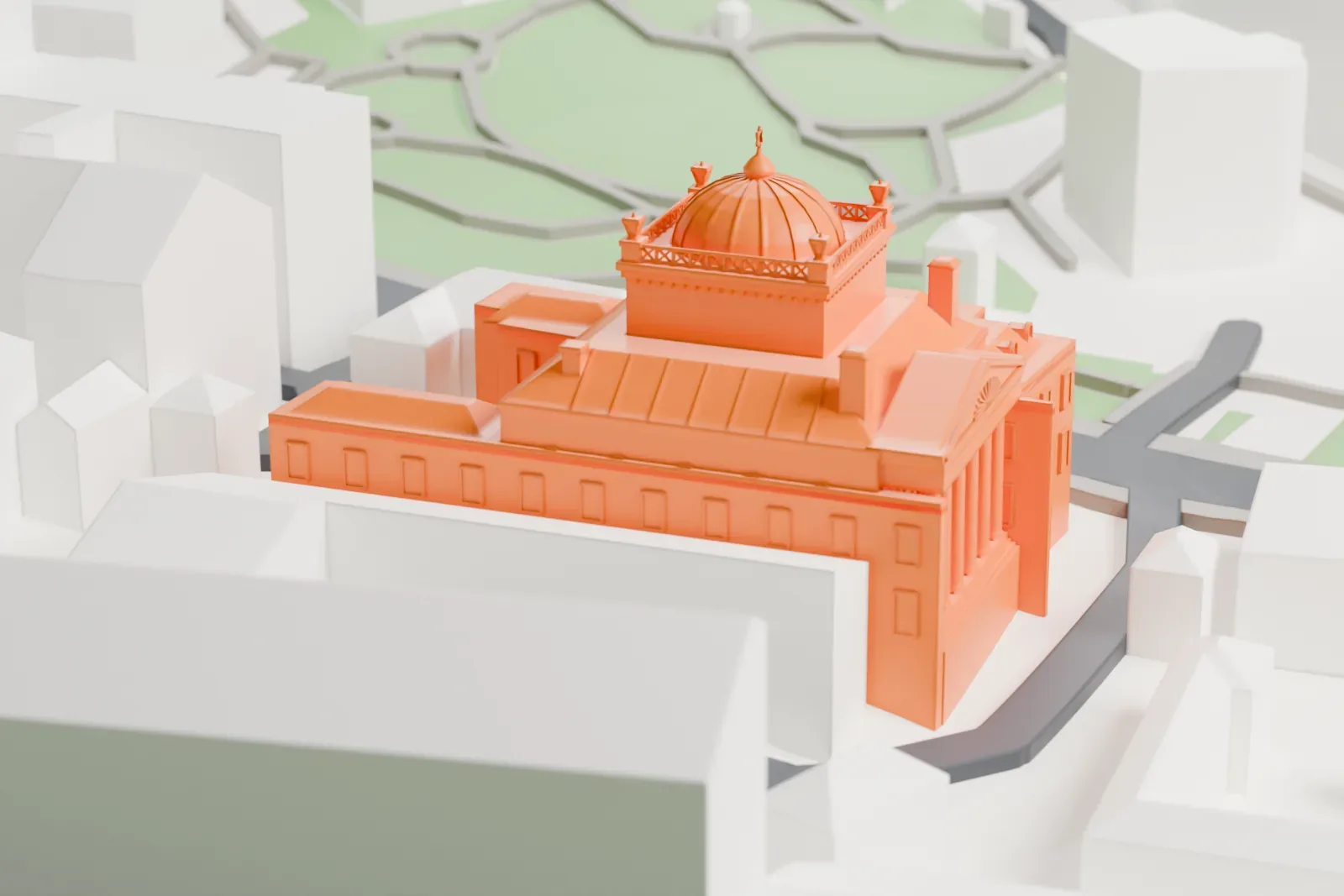 A white 3D print of the Moscow Choral Synagogue standing among surrounding streets and buildings.